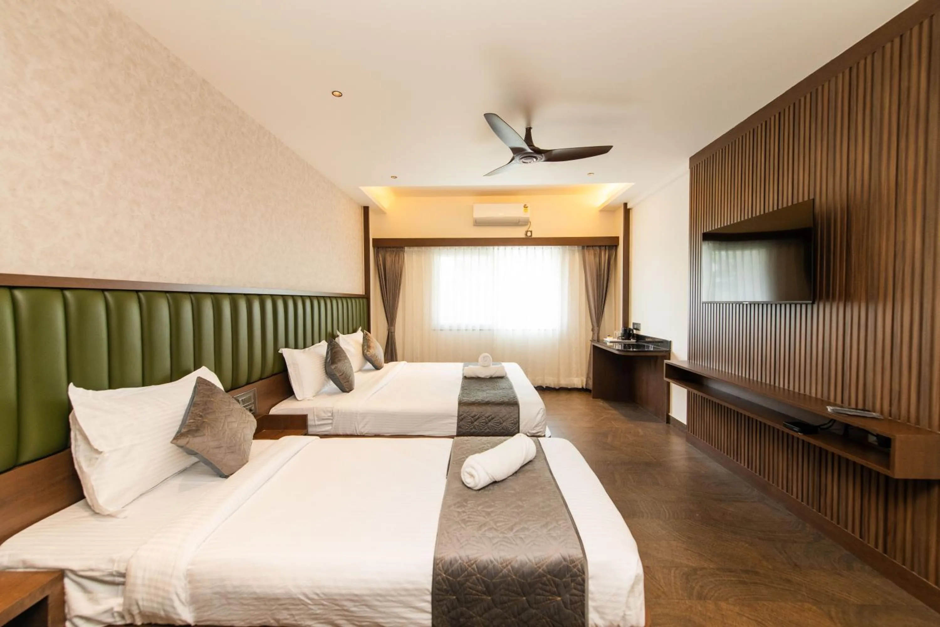 Bed in Hotel Mysore Radiance