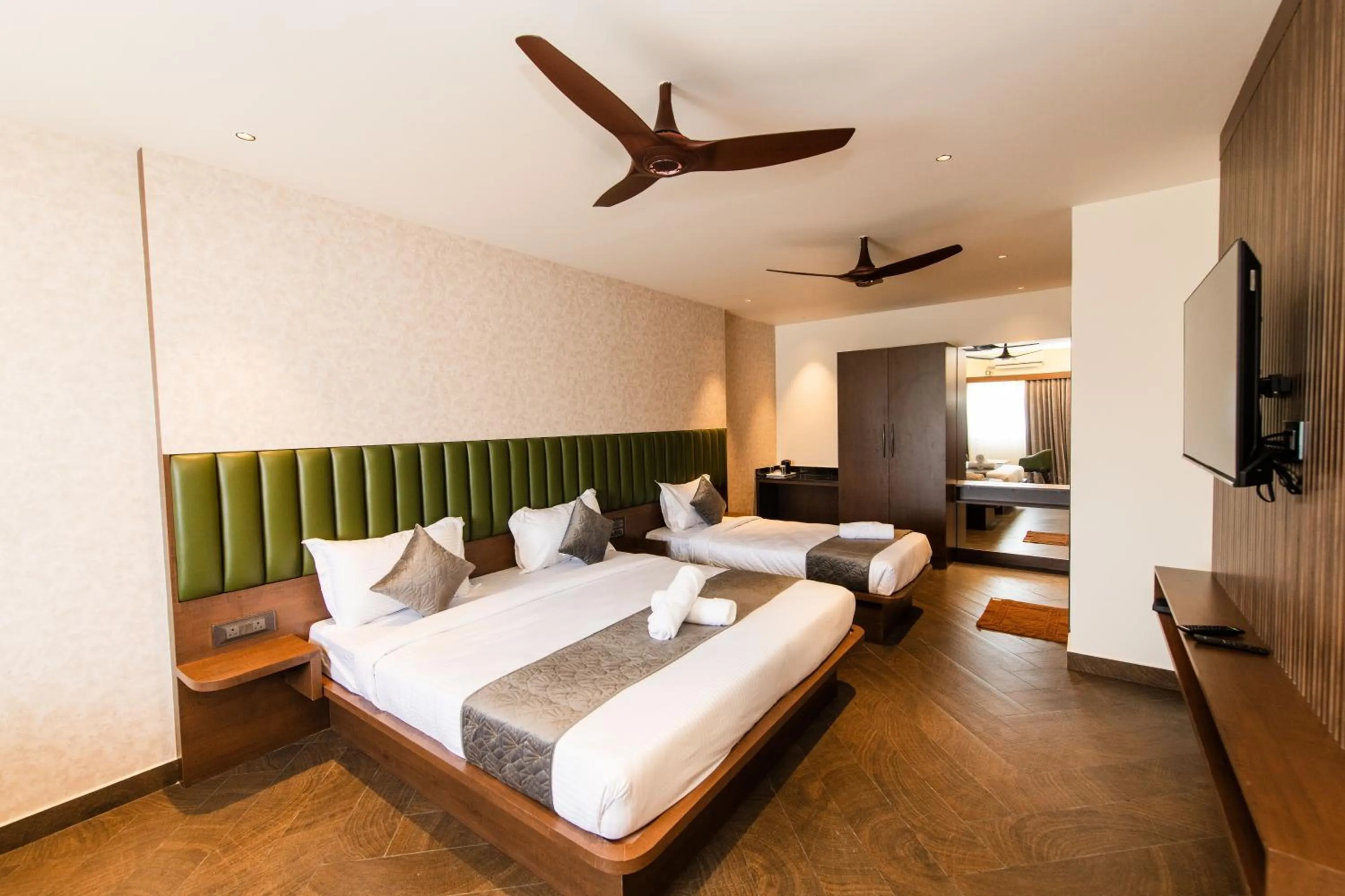 Bed in Hotel Mysore Radiance