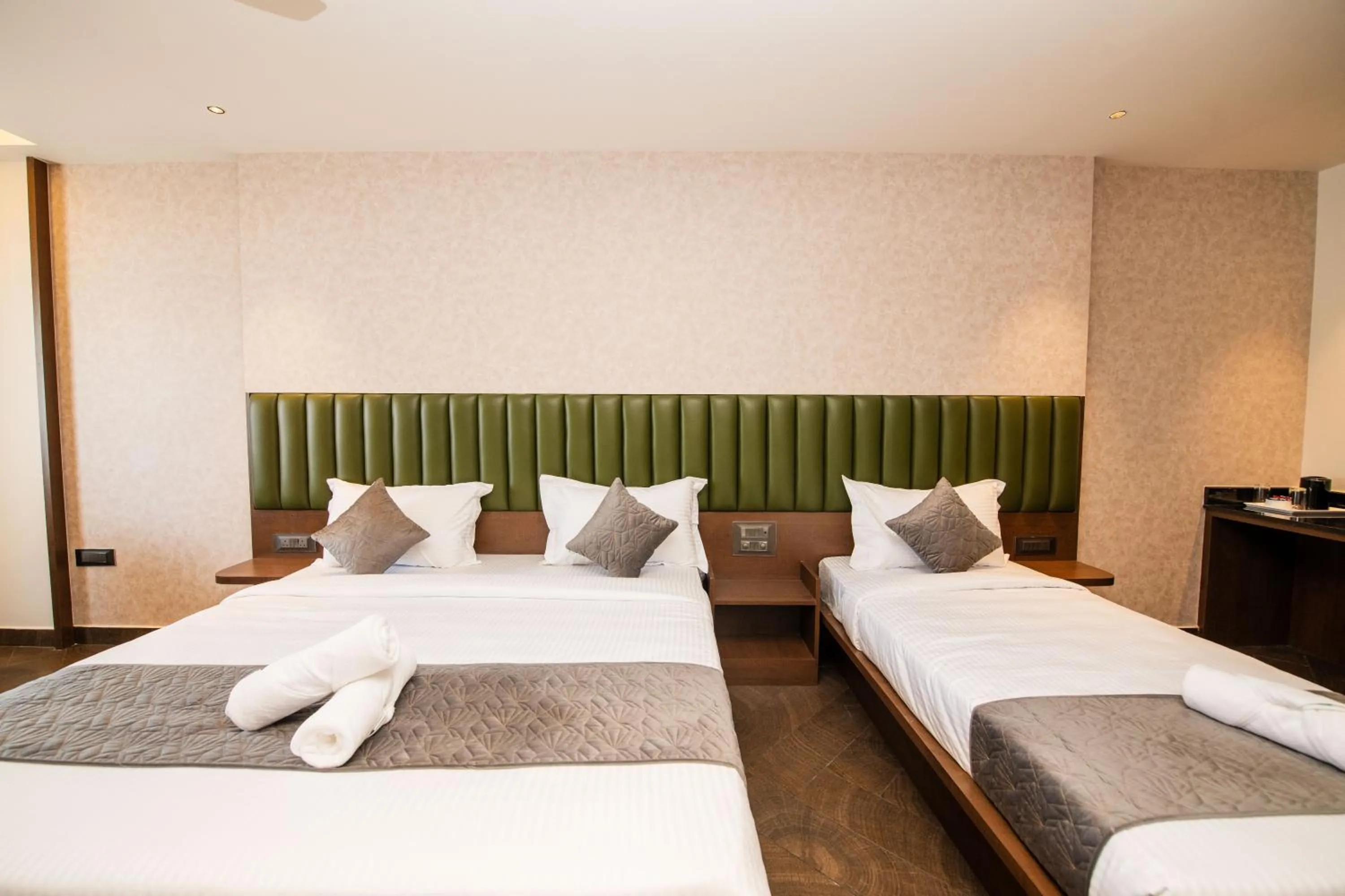 Bed in Hotel Mysore Radiance