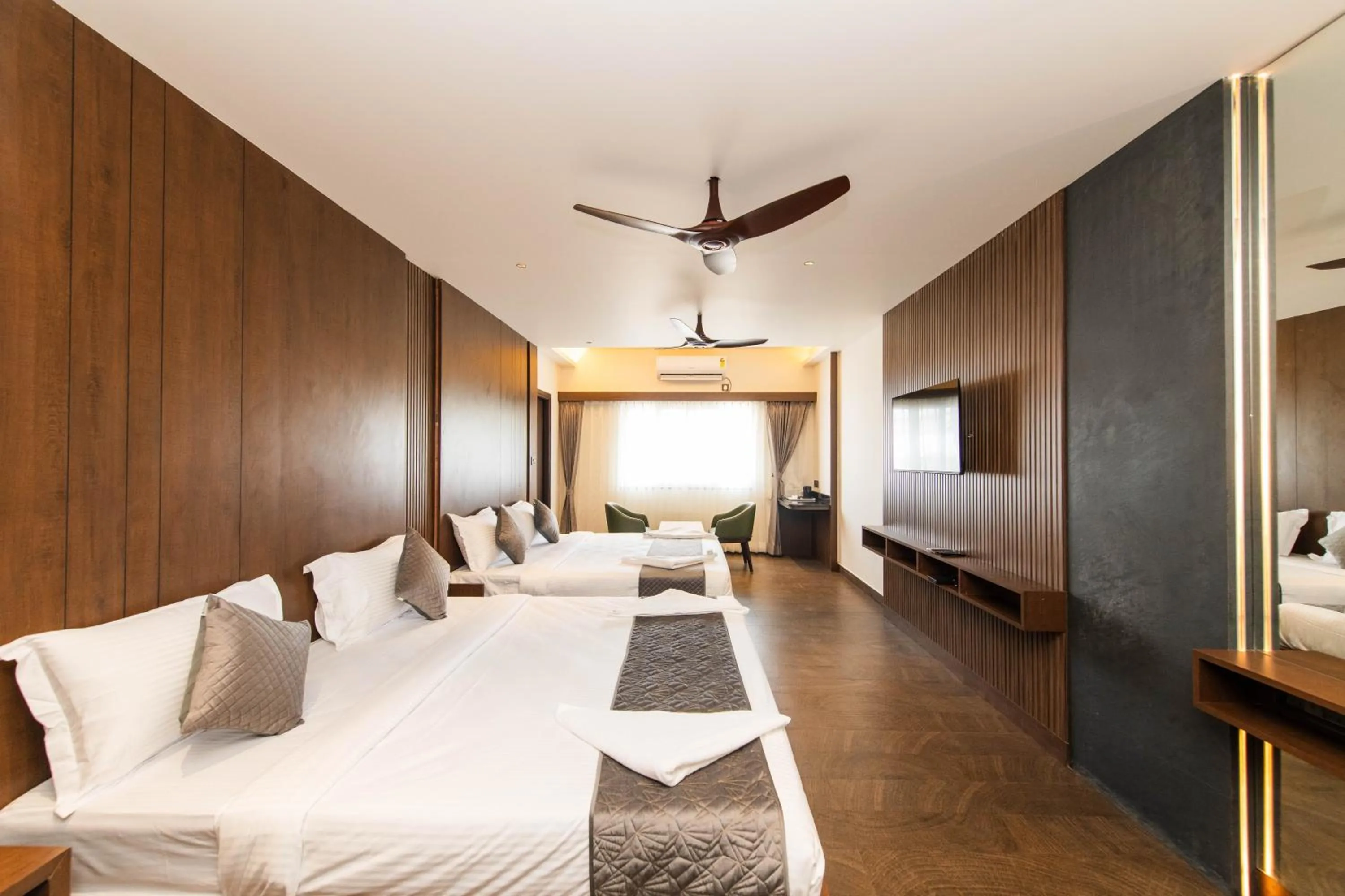 Bed in Hotel Mysore Radiance