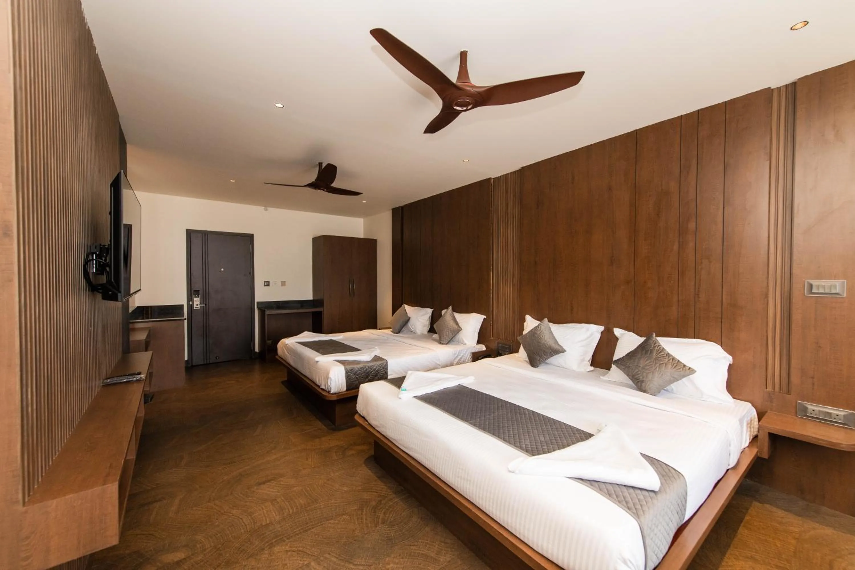 Bed in Hotel Mysore Radiance