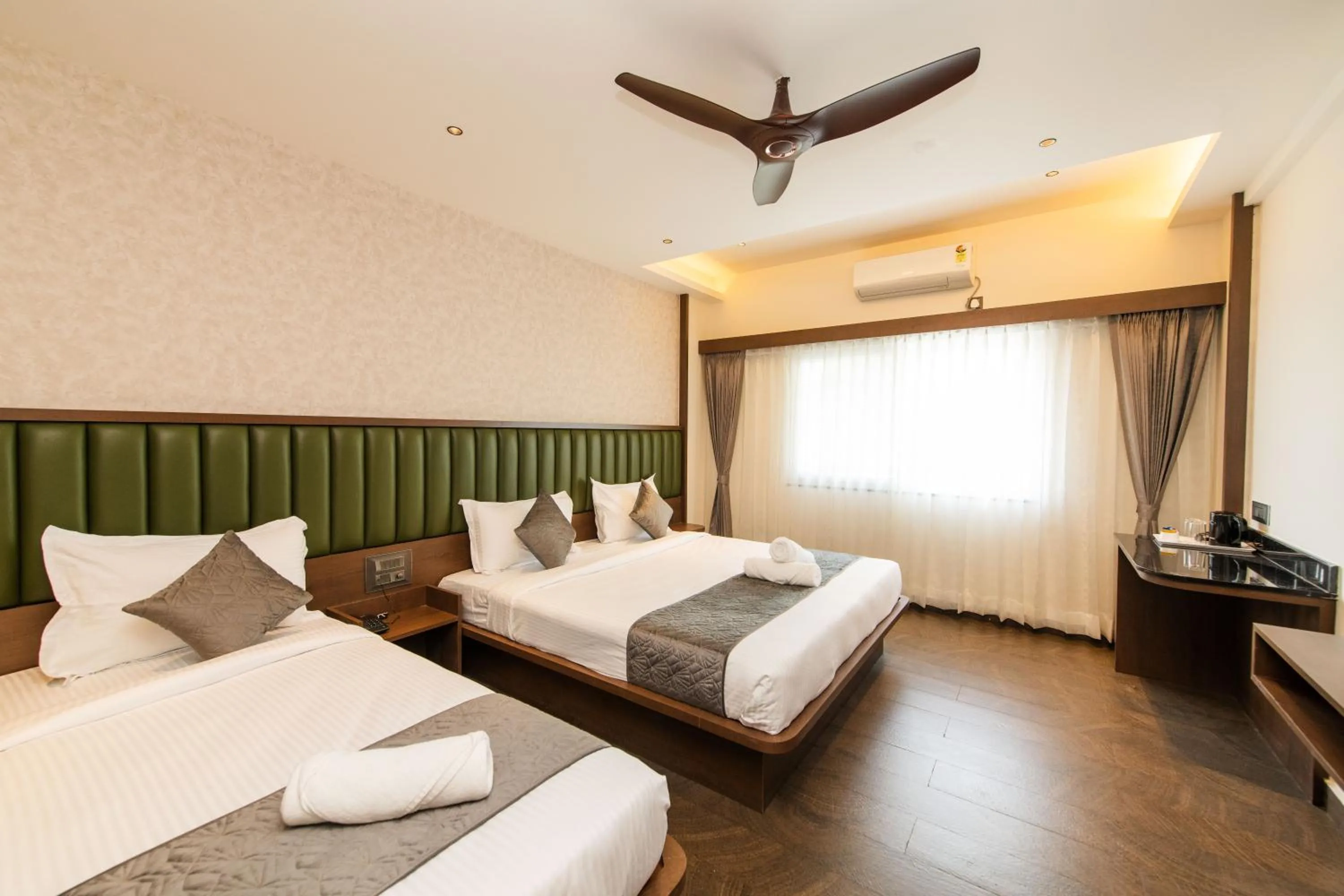 Bed in Hotel Mysore Radiance