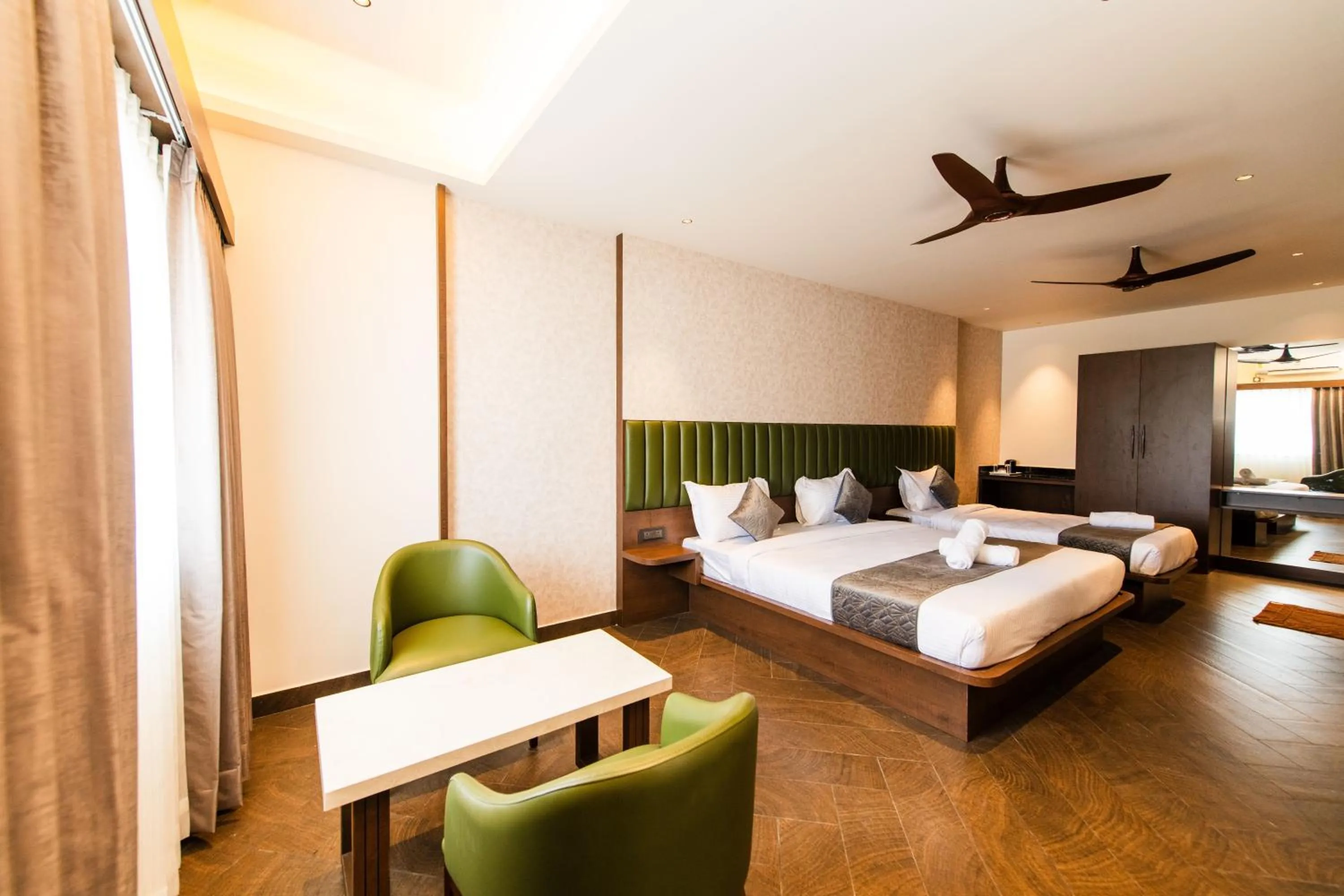 Bed in Hotel Mysore Radiance