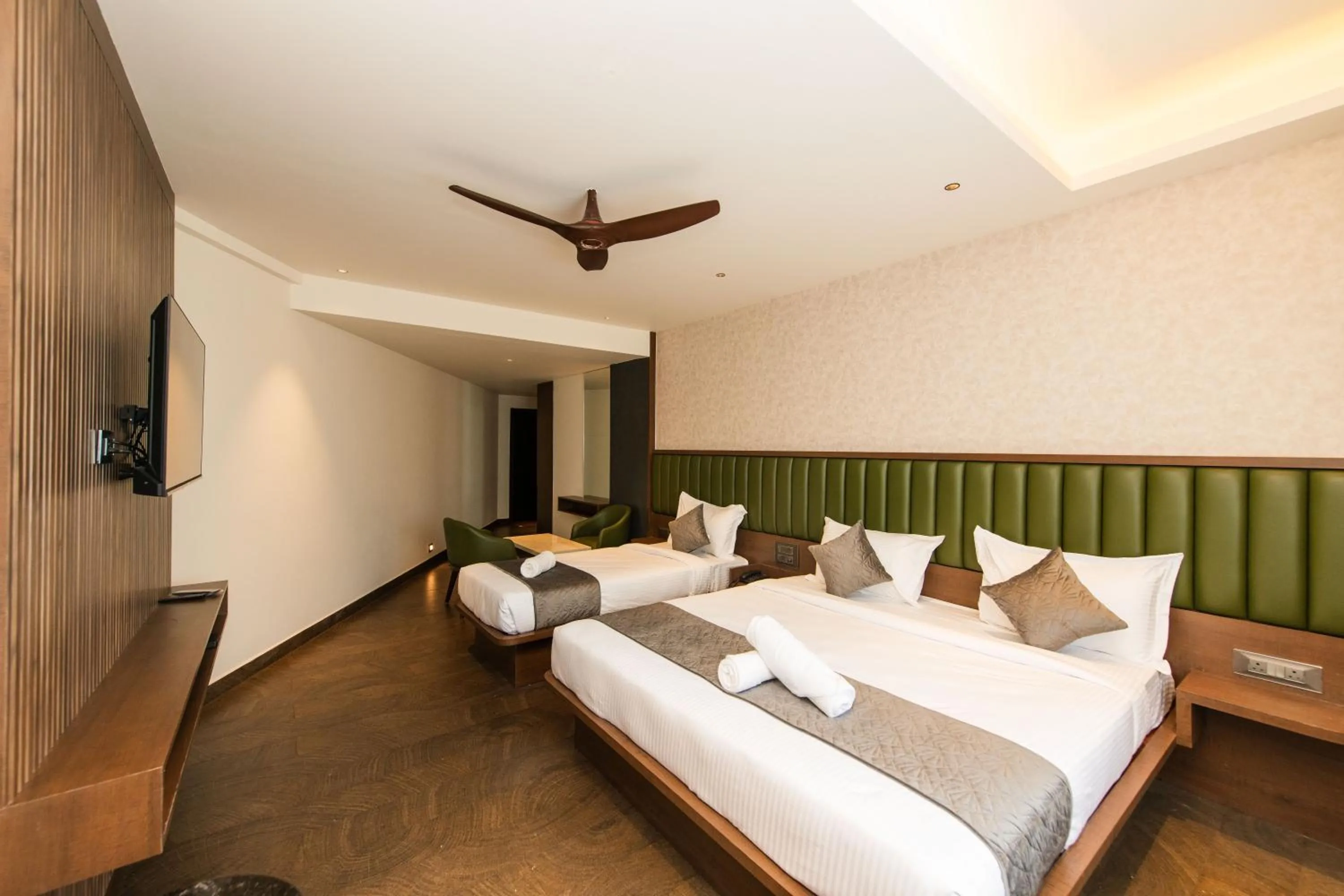Bed in Hotel Mysore Radiance