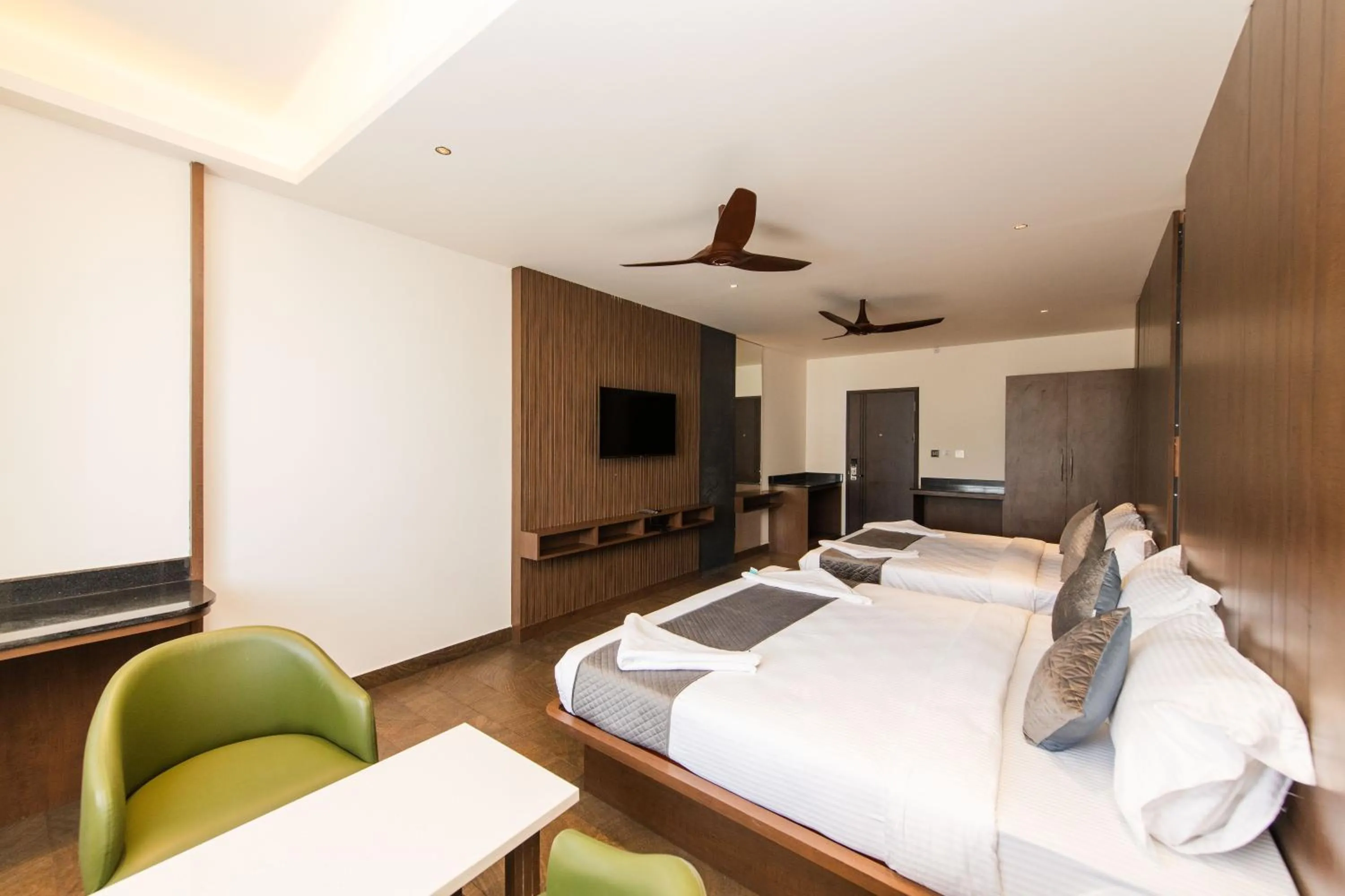 Bed in Hotel Mysore Radiance