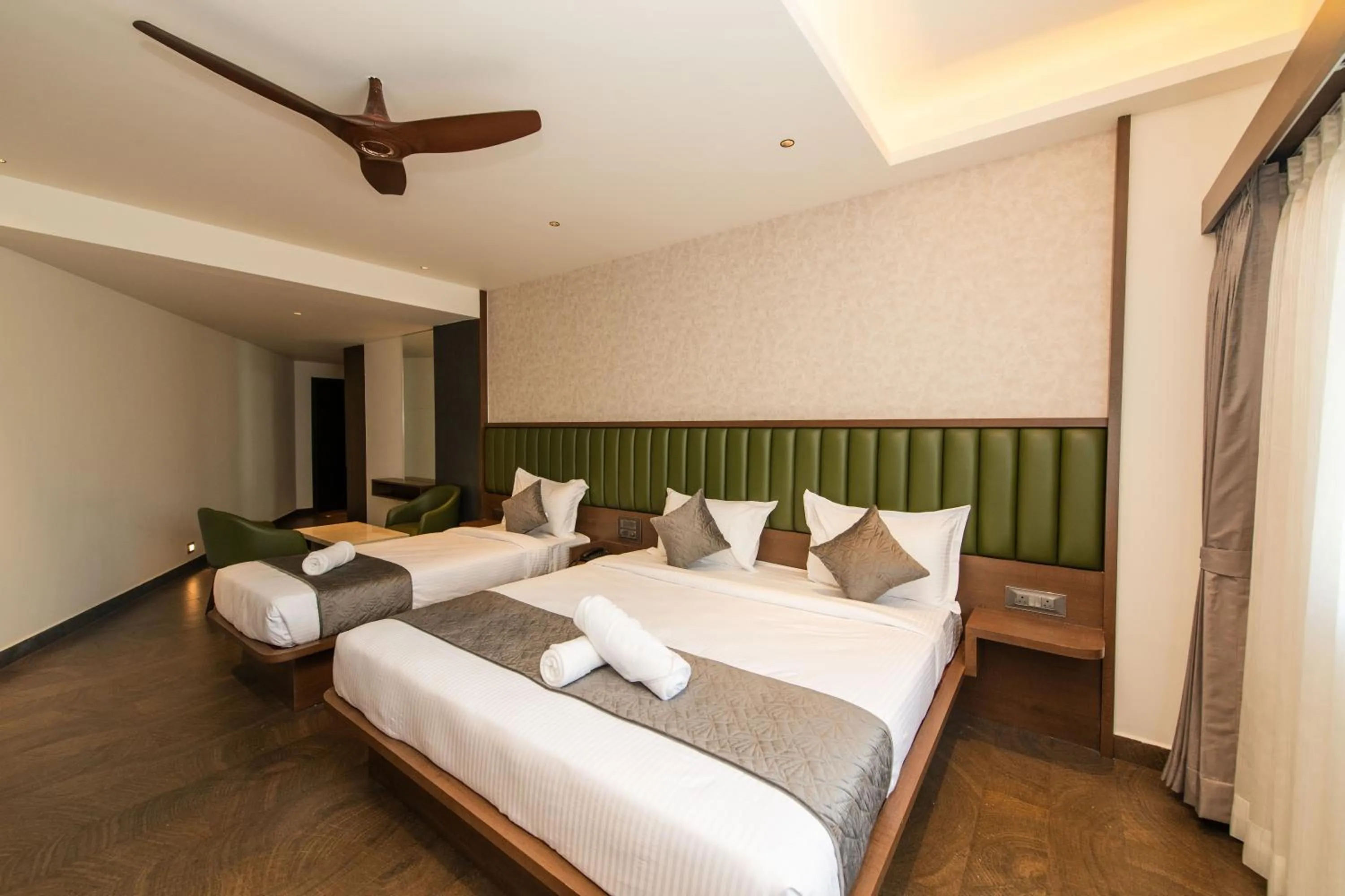 Bed in Hotel Mysore Radiance