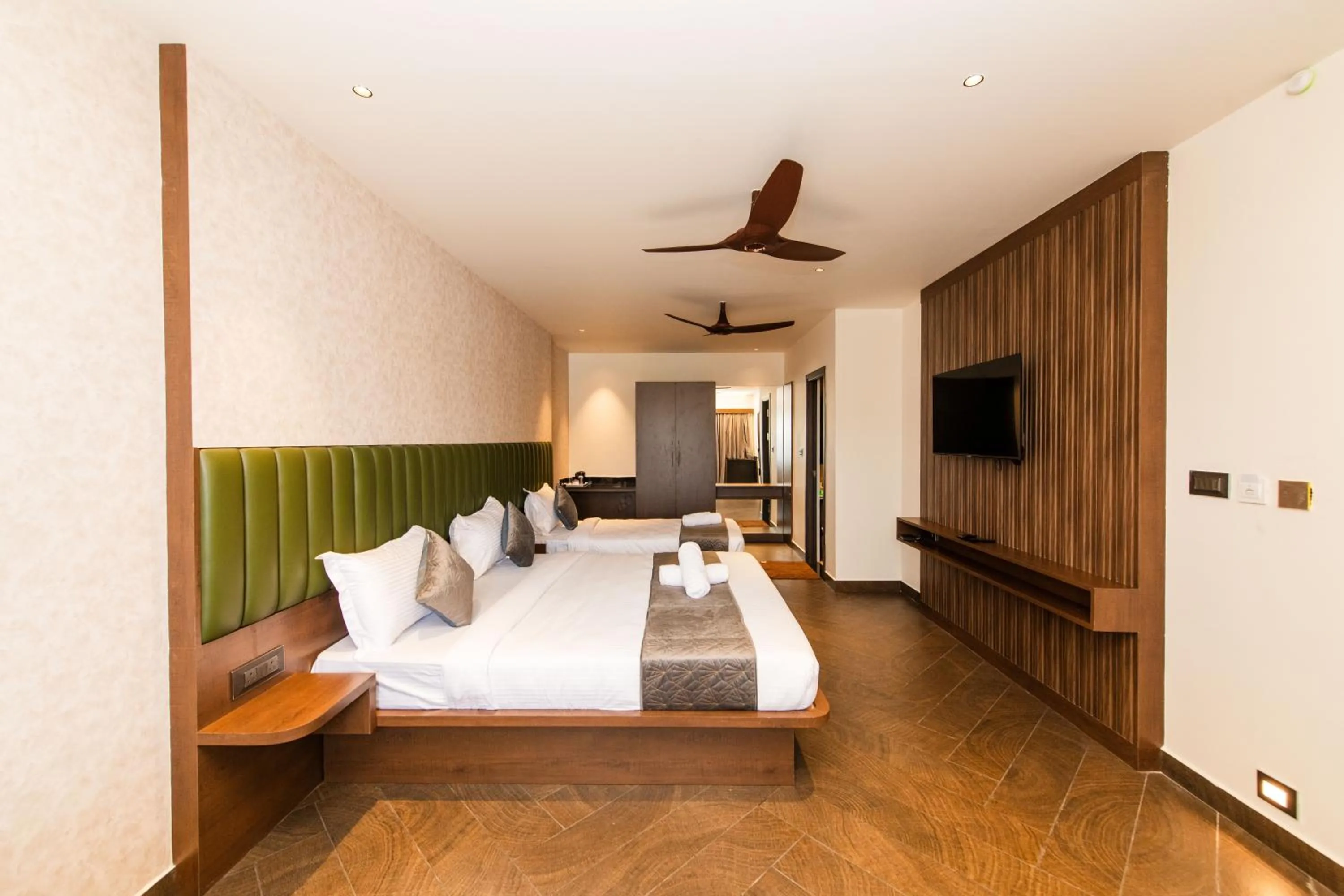 Bed in Hotel Mysore Radiance