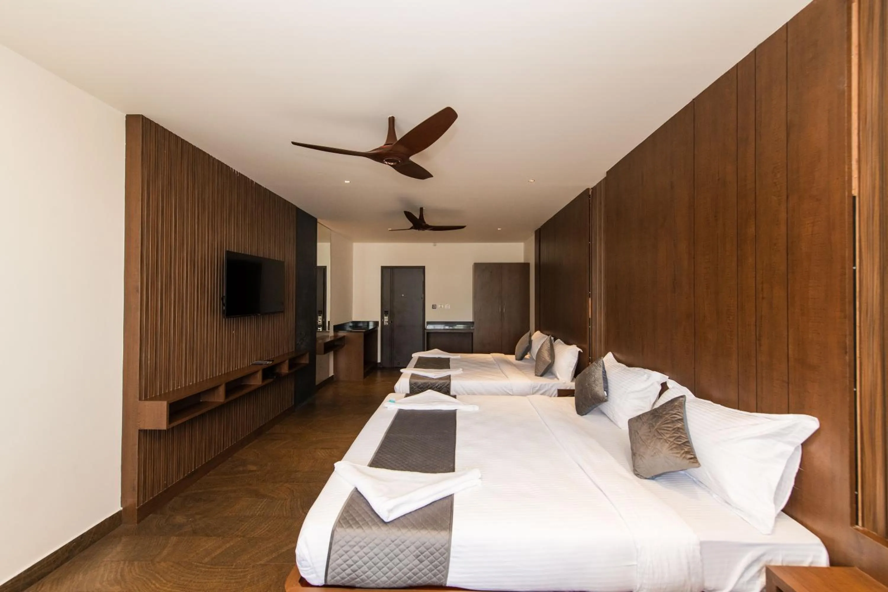 Bed in Hotel Mysore Radiance