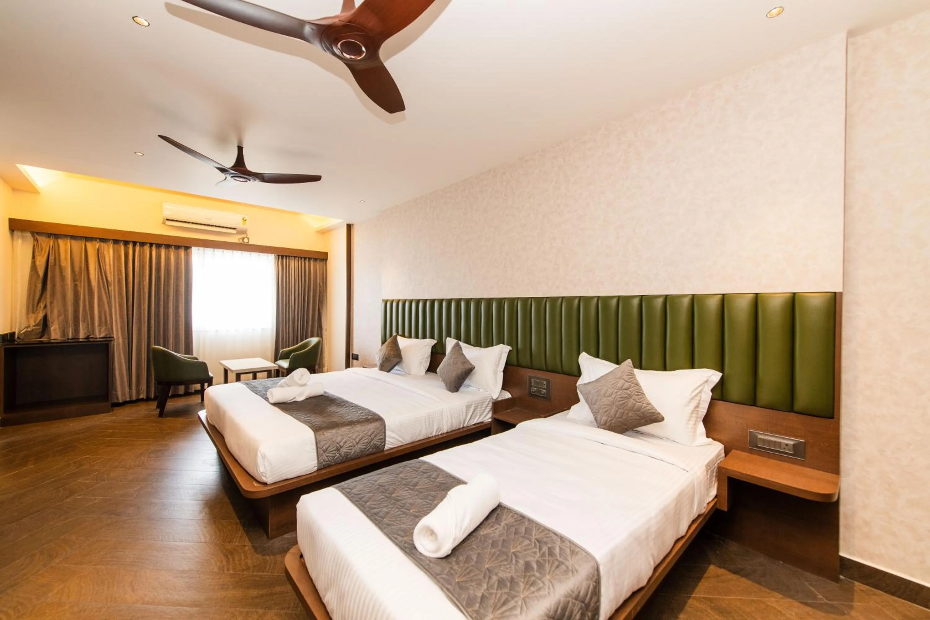 Bed in Hotel Mysore Radiance