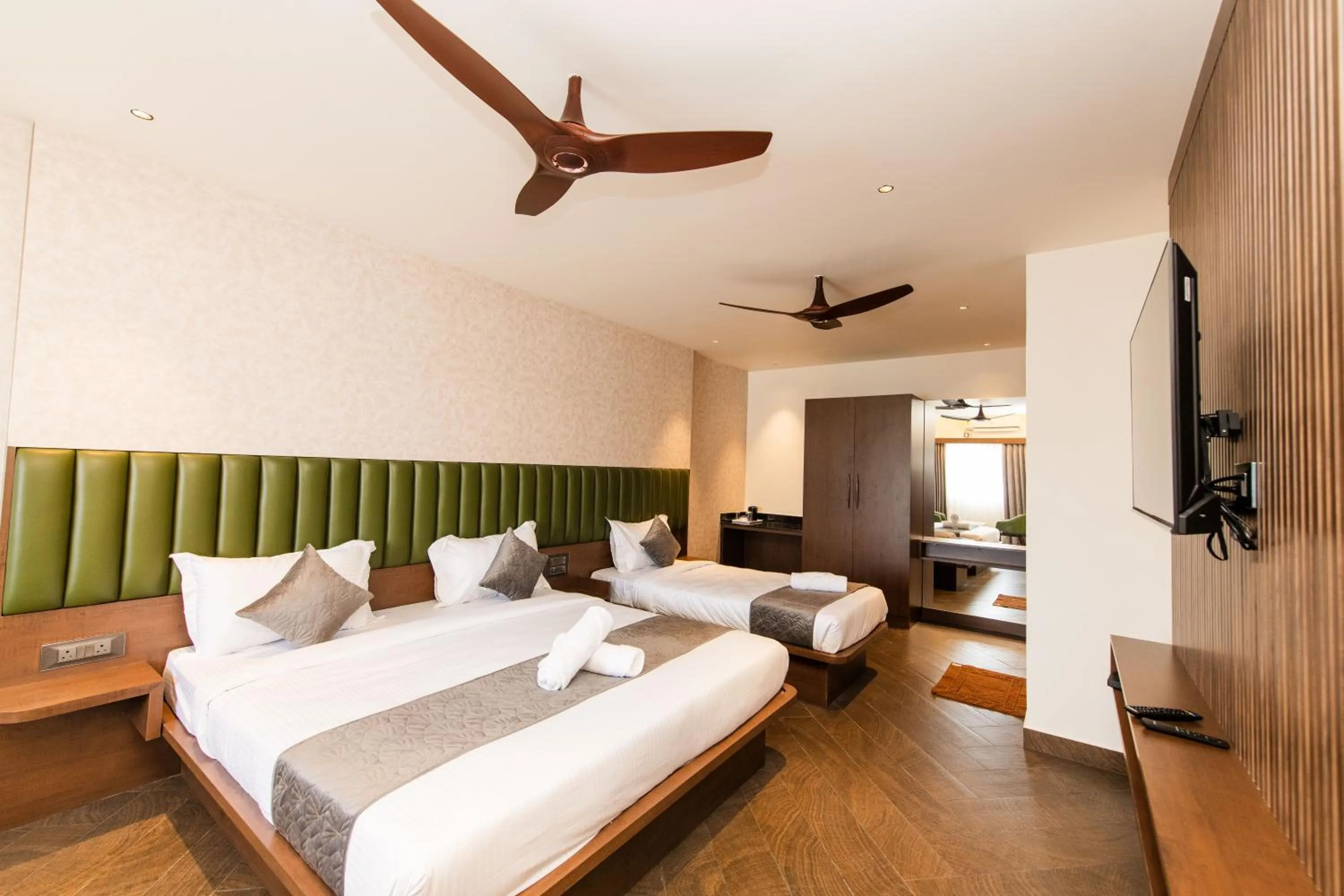 Bed in Hotel Mysore Radiance