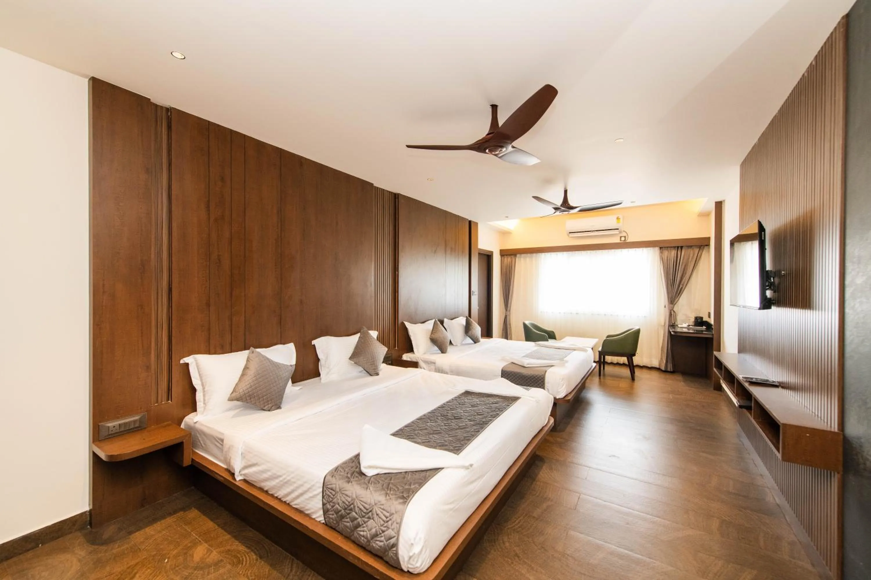 Bed in Hotel Mysore Radiance