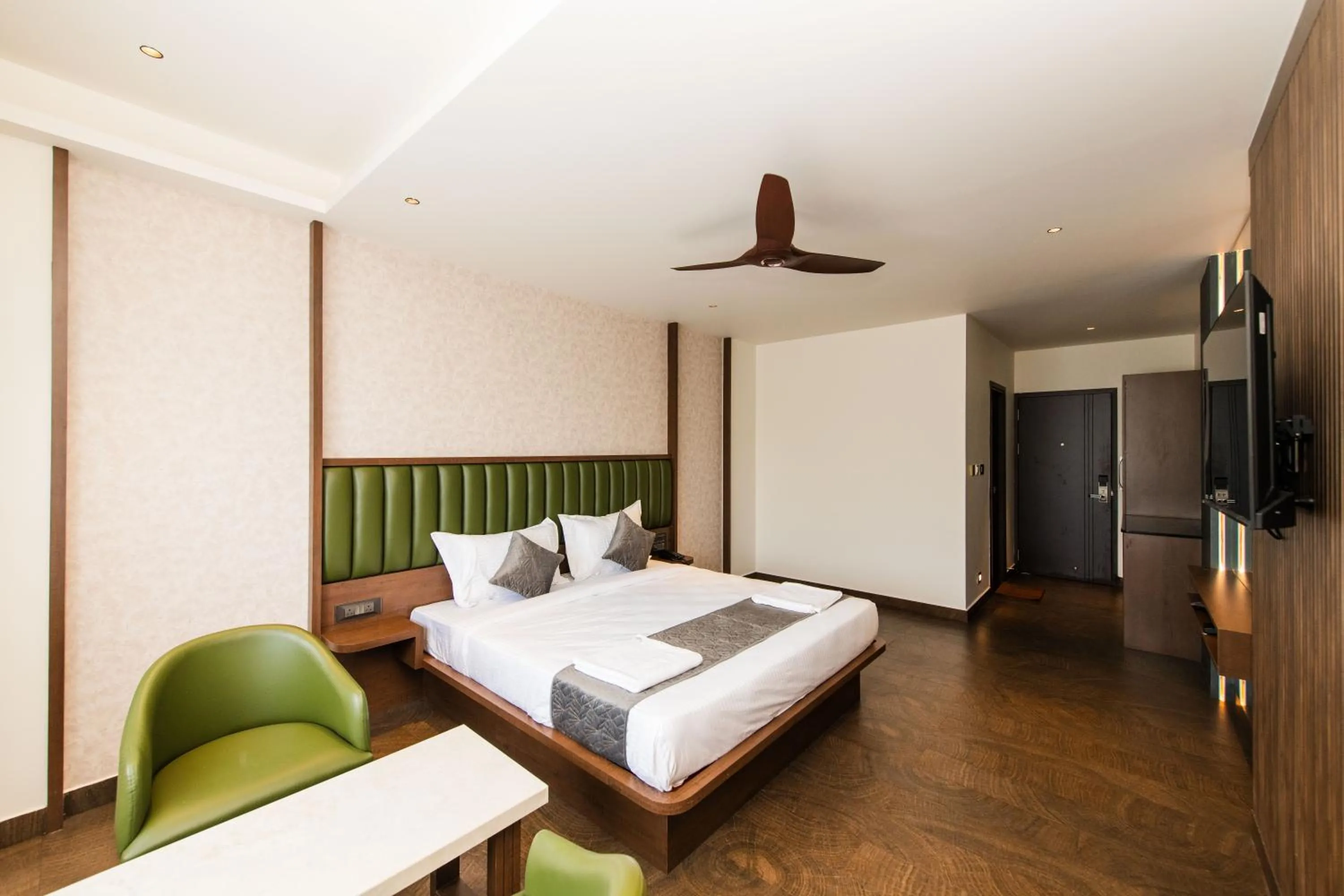 Bed in Hotel Mysore Radiance
