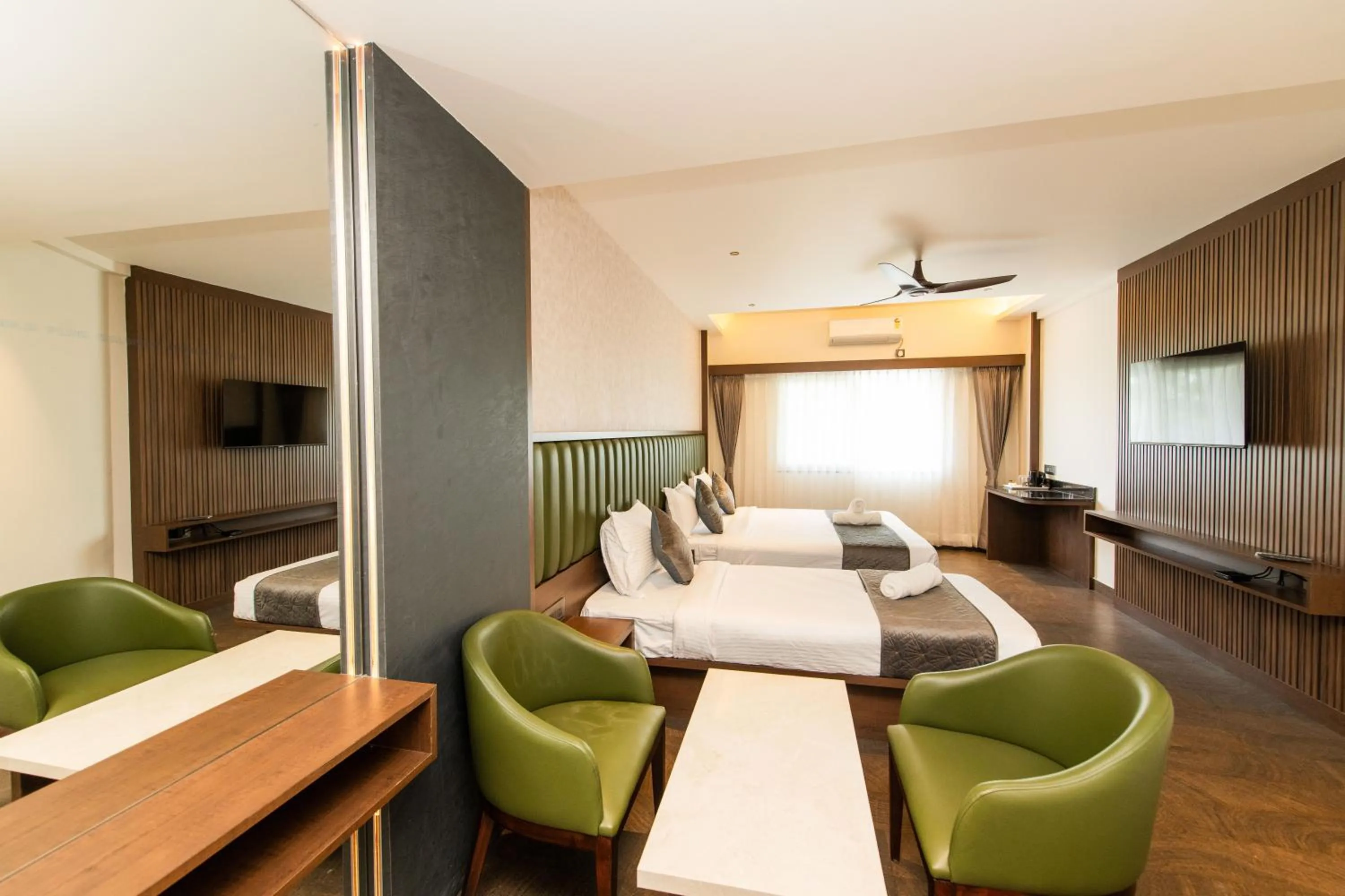 Bed in Hotel Mysore Radiance