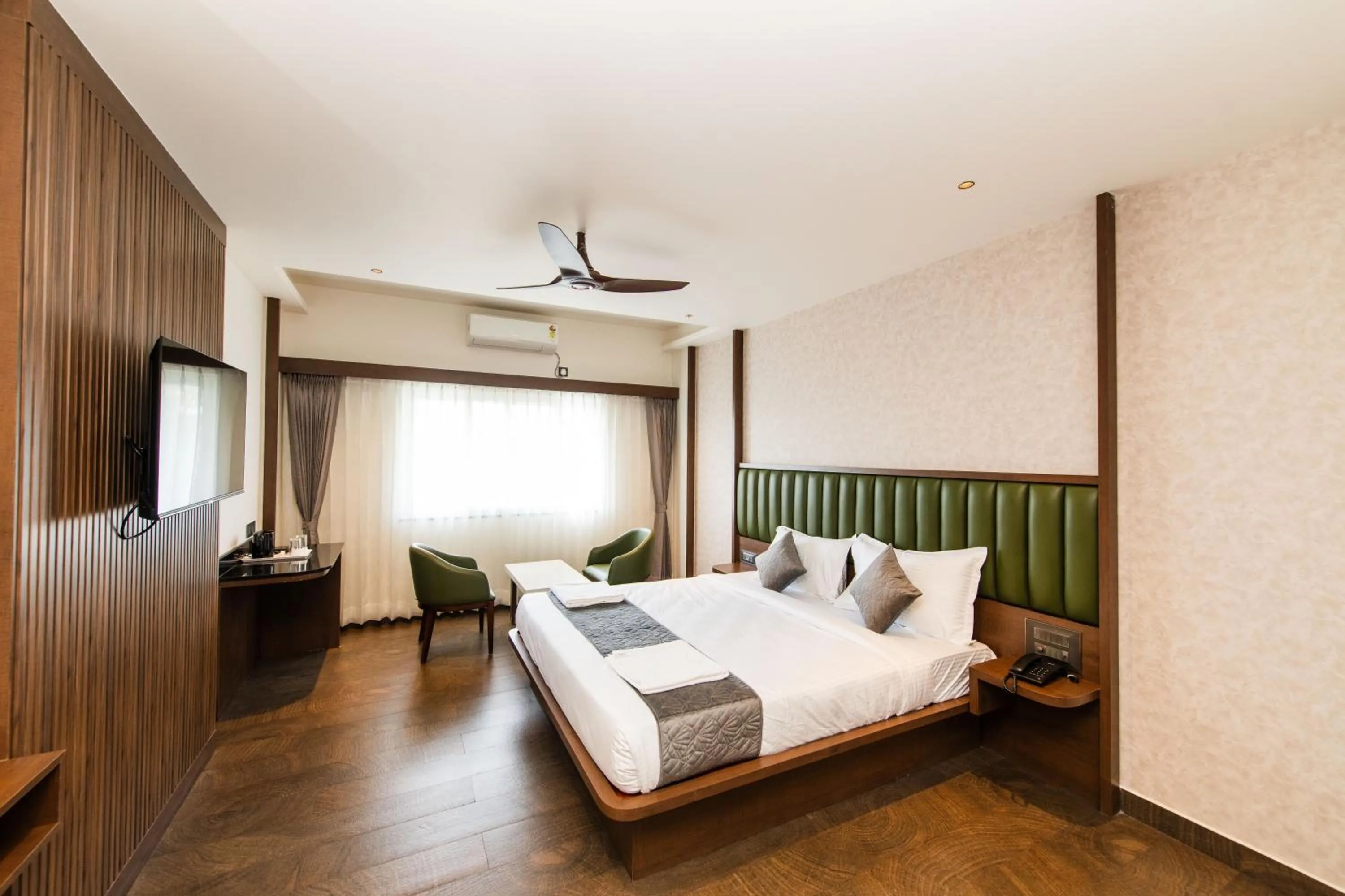 Bed in Hotel Mysore Radiance
