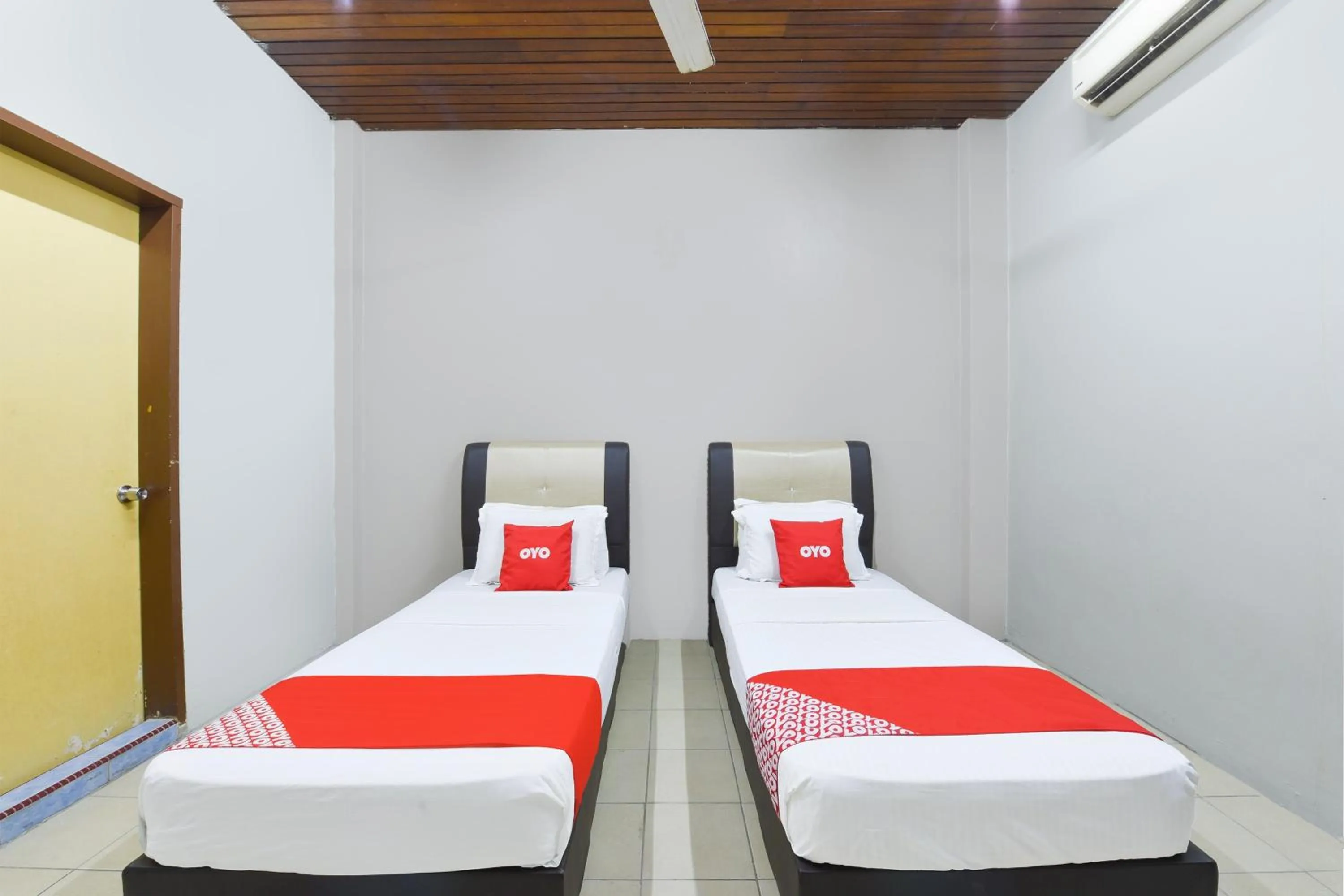 Bedroom in OYO 91052 Hotel Kenangan