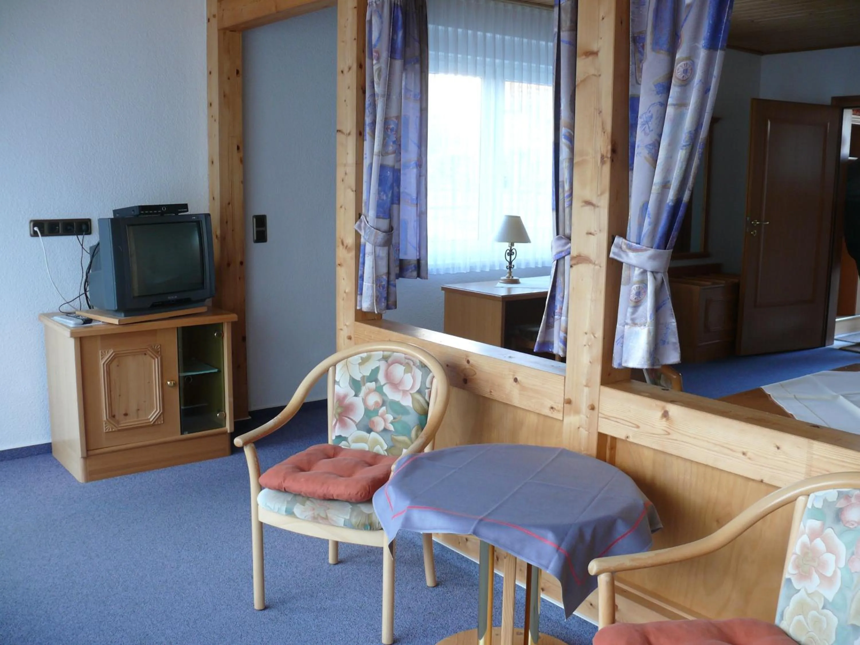 Photo of the whole room, Bed in Waldhotel Dornröschenshöh