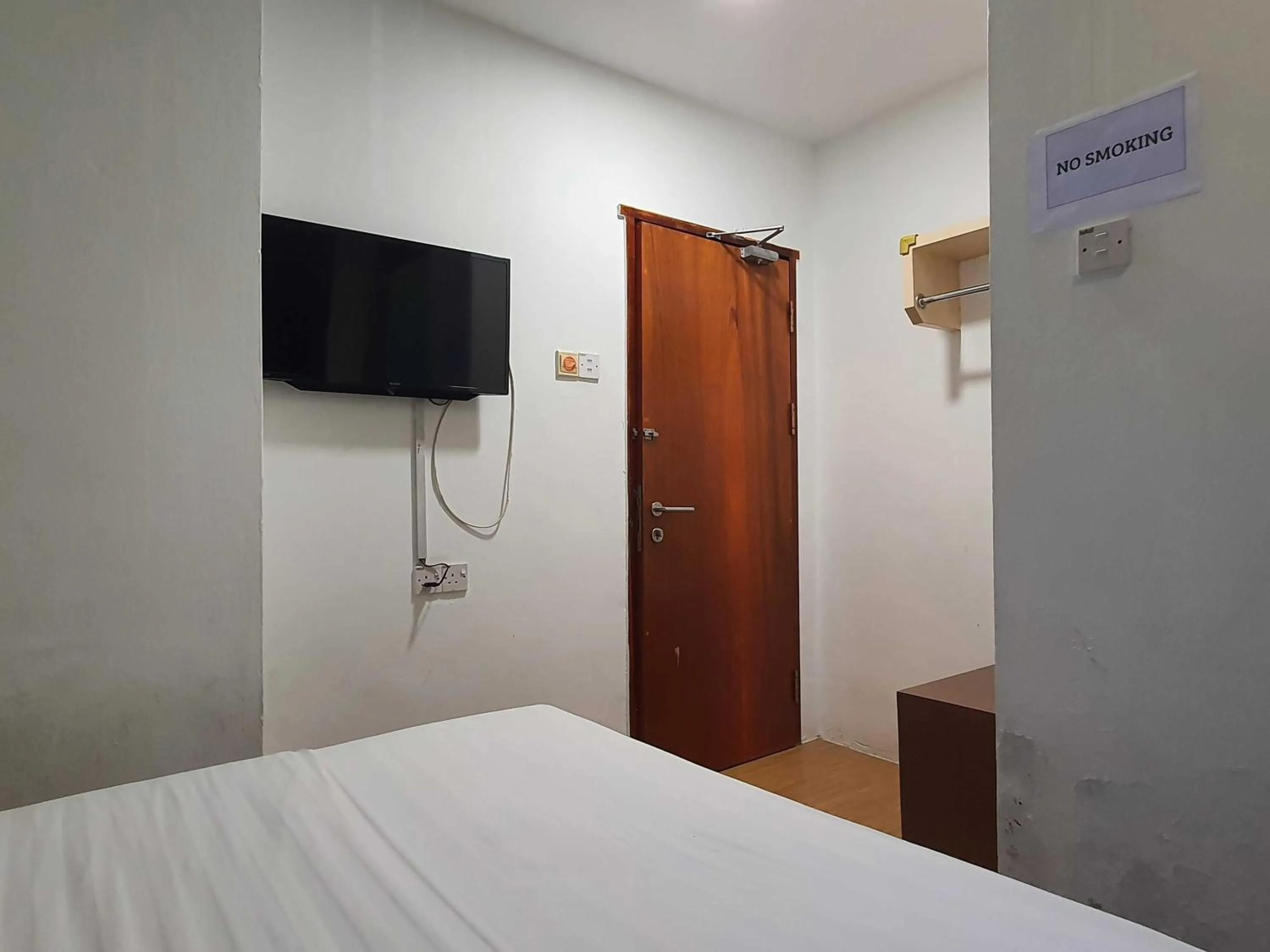 Bedroom in Hotel O Signature Inn Miri