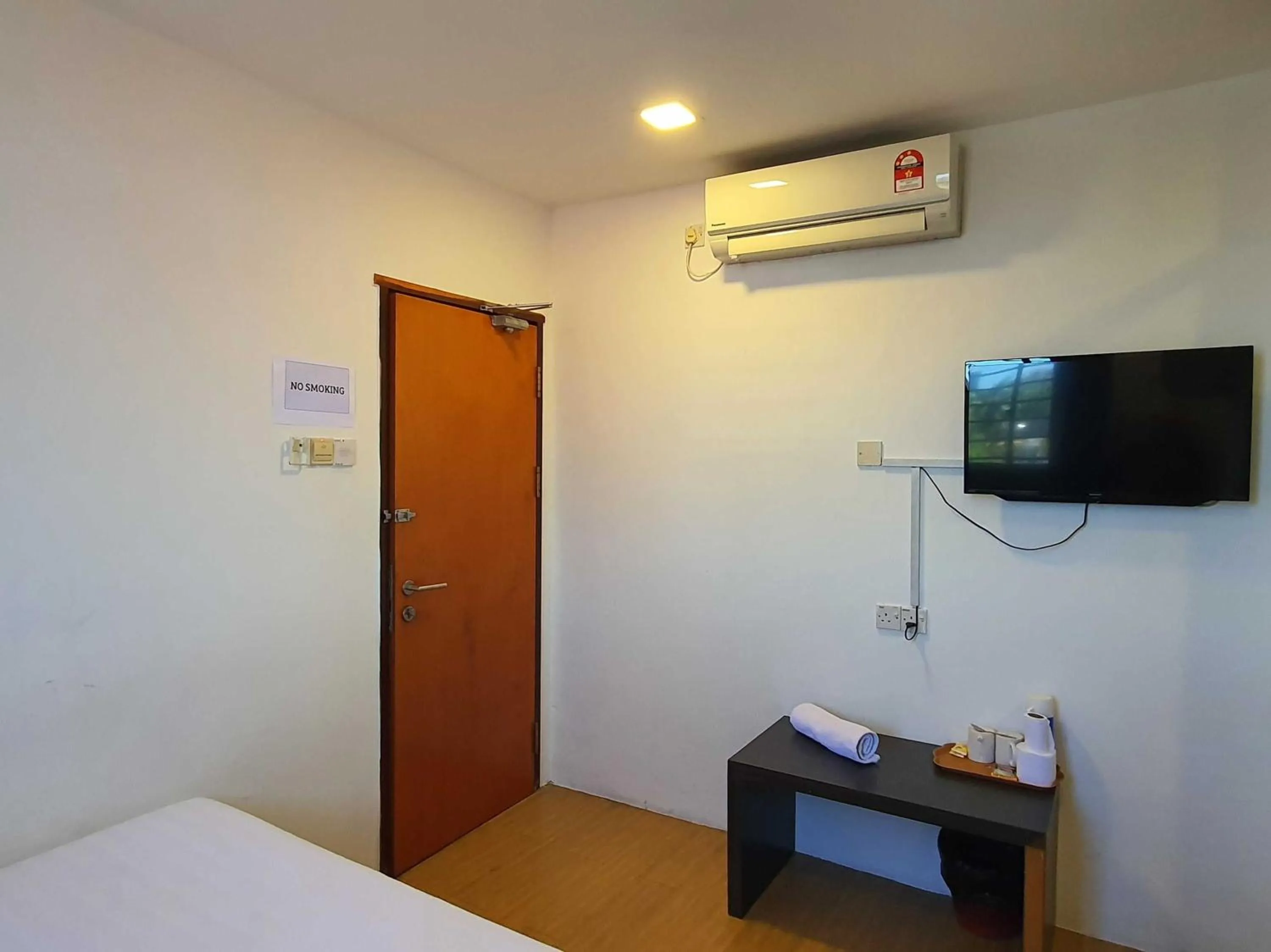 Bedroom in Hotel O Signature Inn Miri