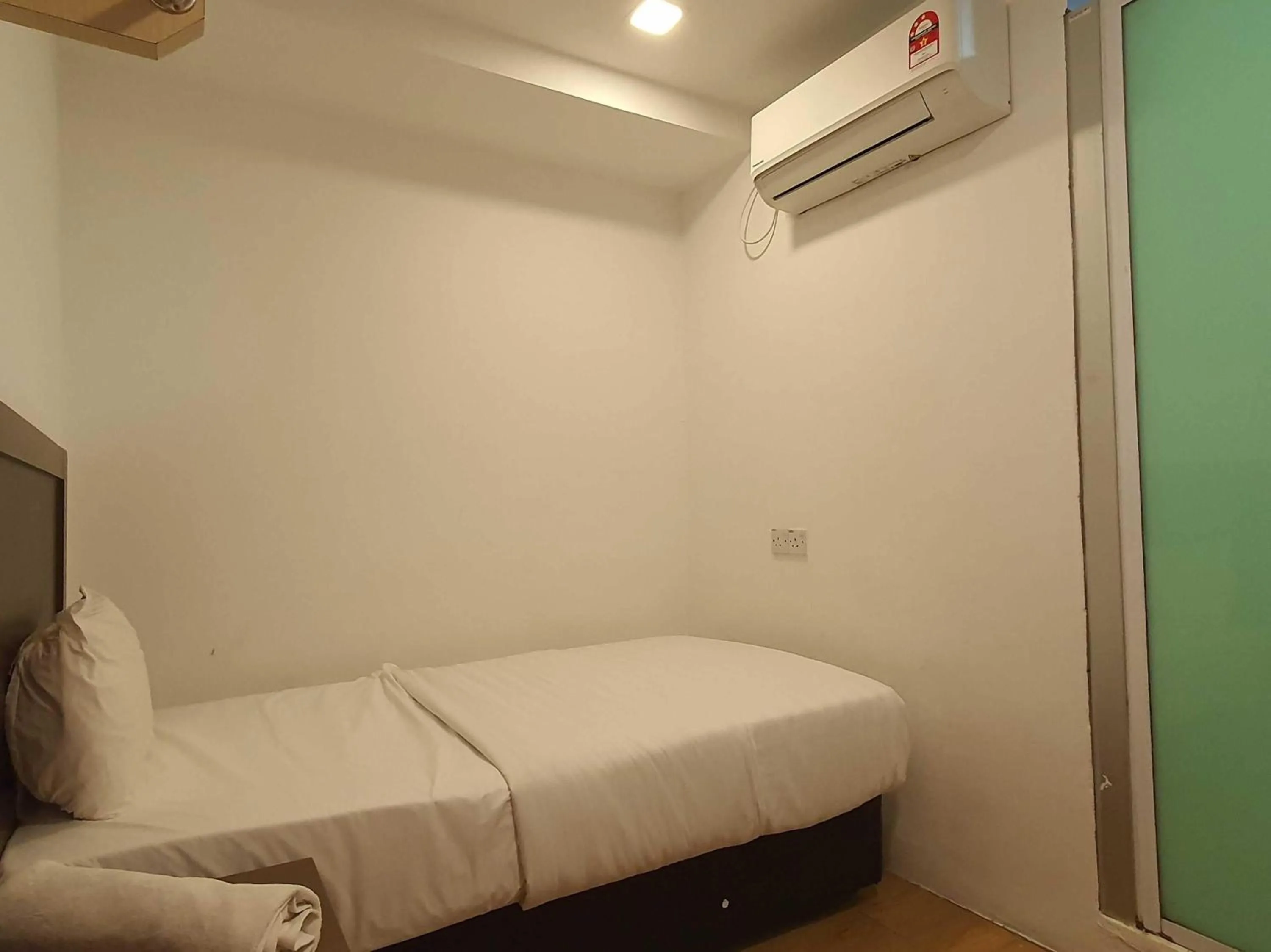 Bedroom in Hotel O Signature Inn Miri