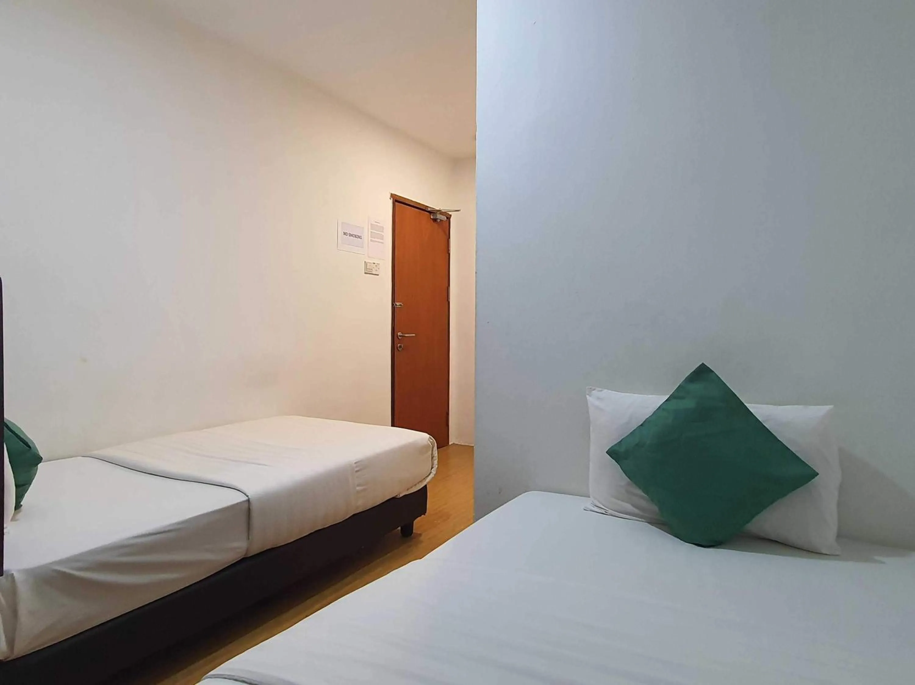 Bedroom in Hotel O Signature Inn Miri