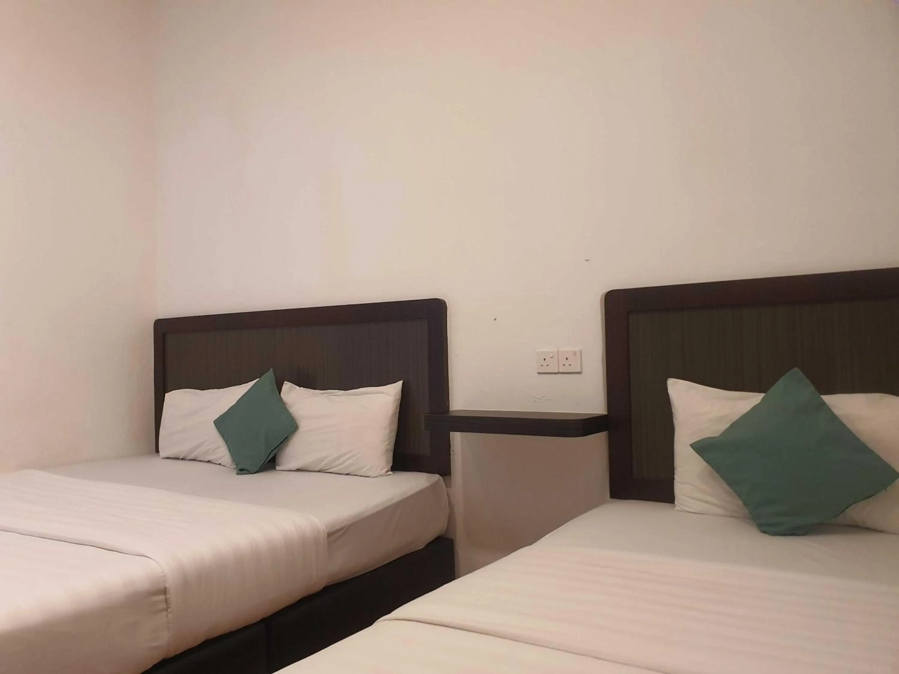 Bedroom in Hotel O Signature Inn Miri