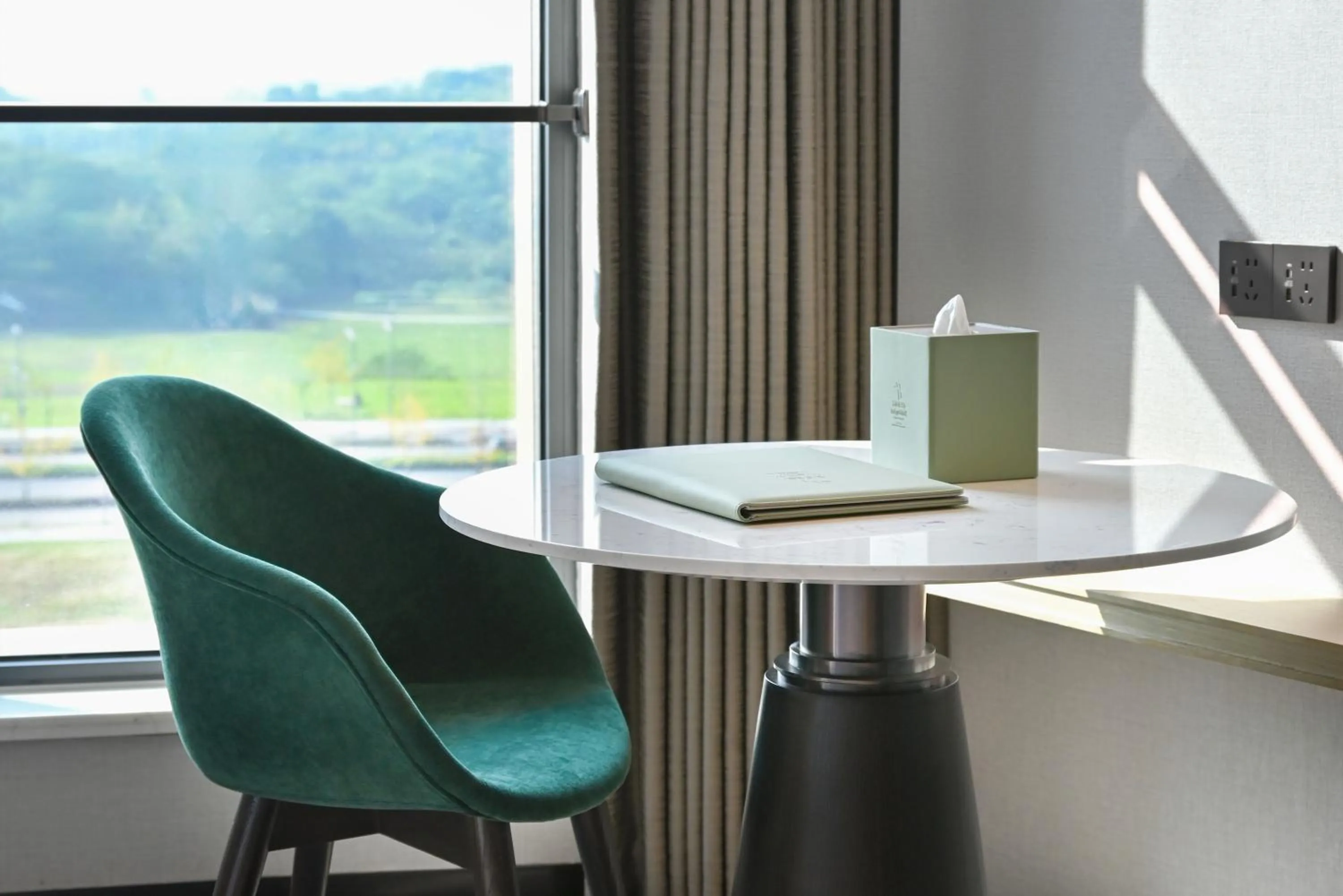 Seating area in Holiday Inn Chongqing Science Hall by IHG