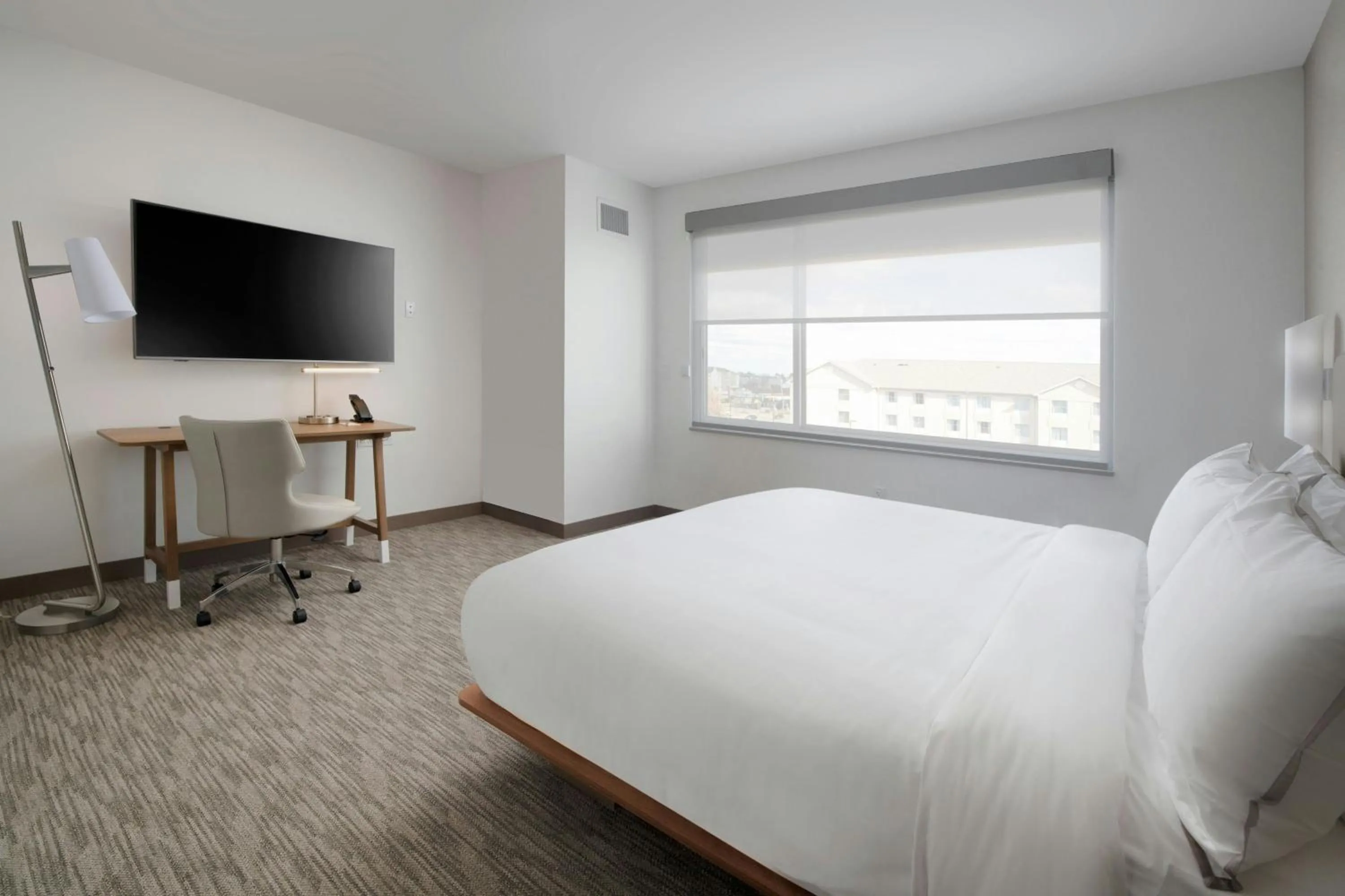 Photo of the whole room, Bed in Element Fort Smith