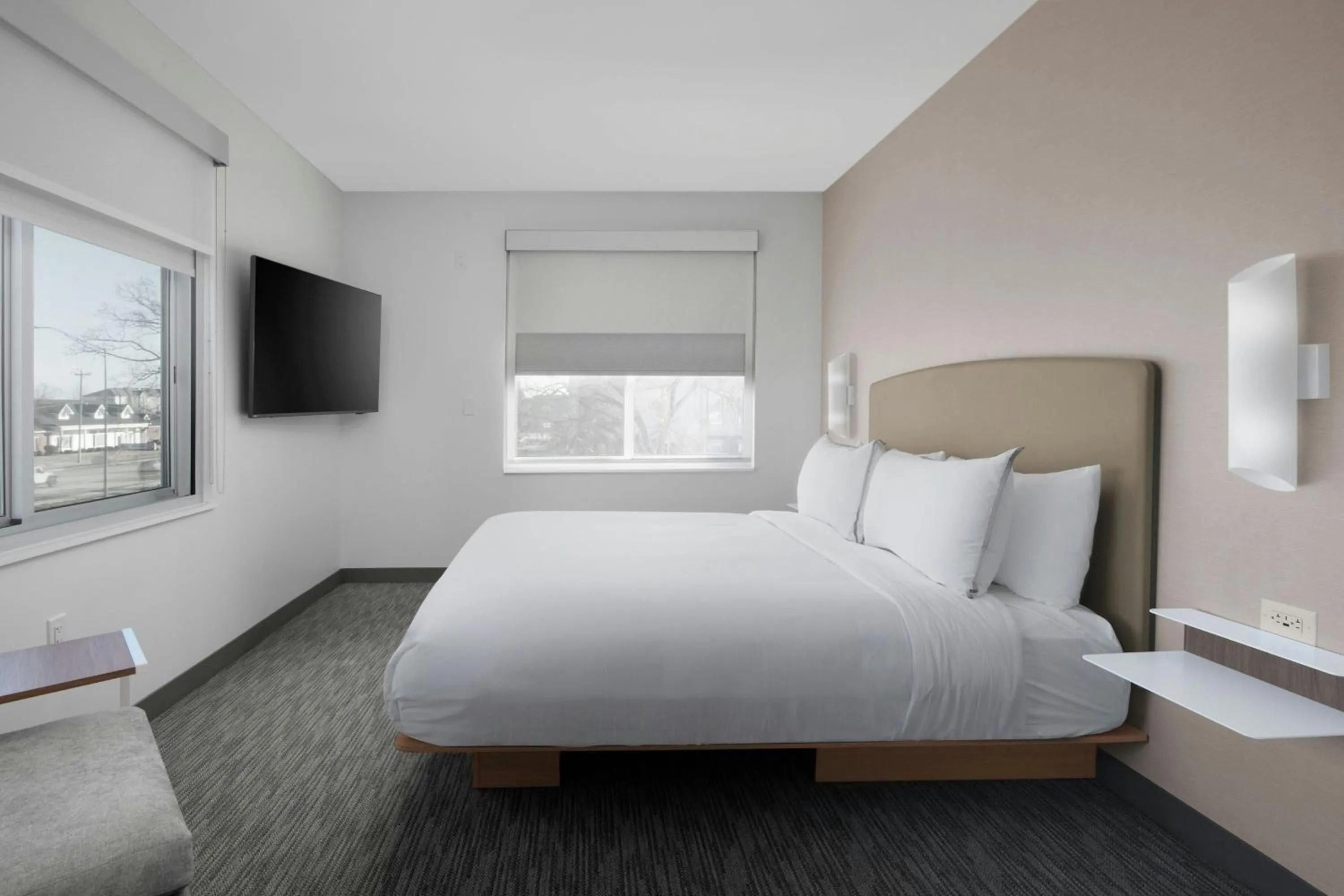 Photo of the whole room, Bed in Element Fort Smith