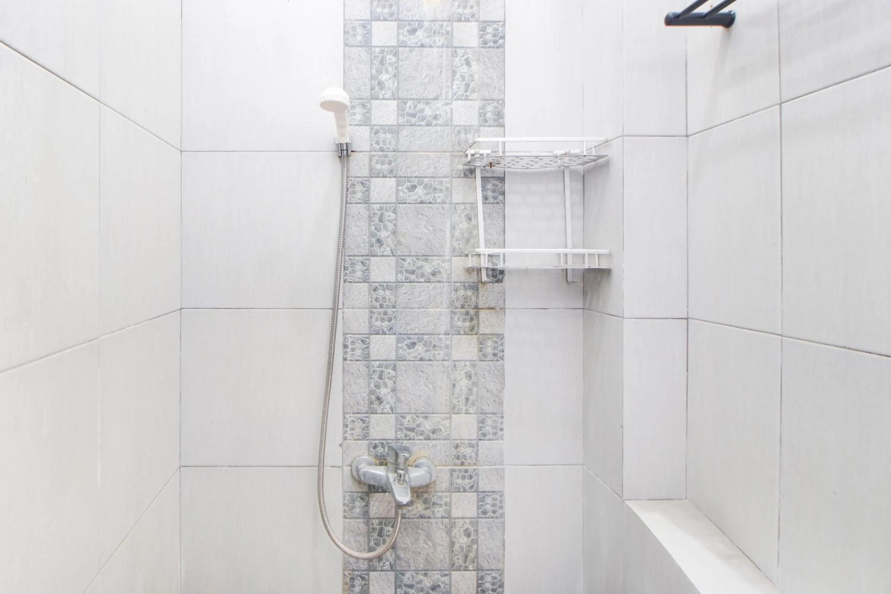 Bathroom in Capital O 94314 Sunny Co Living