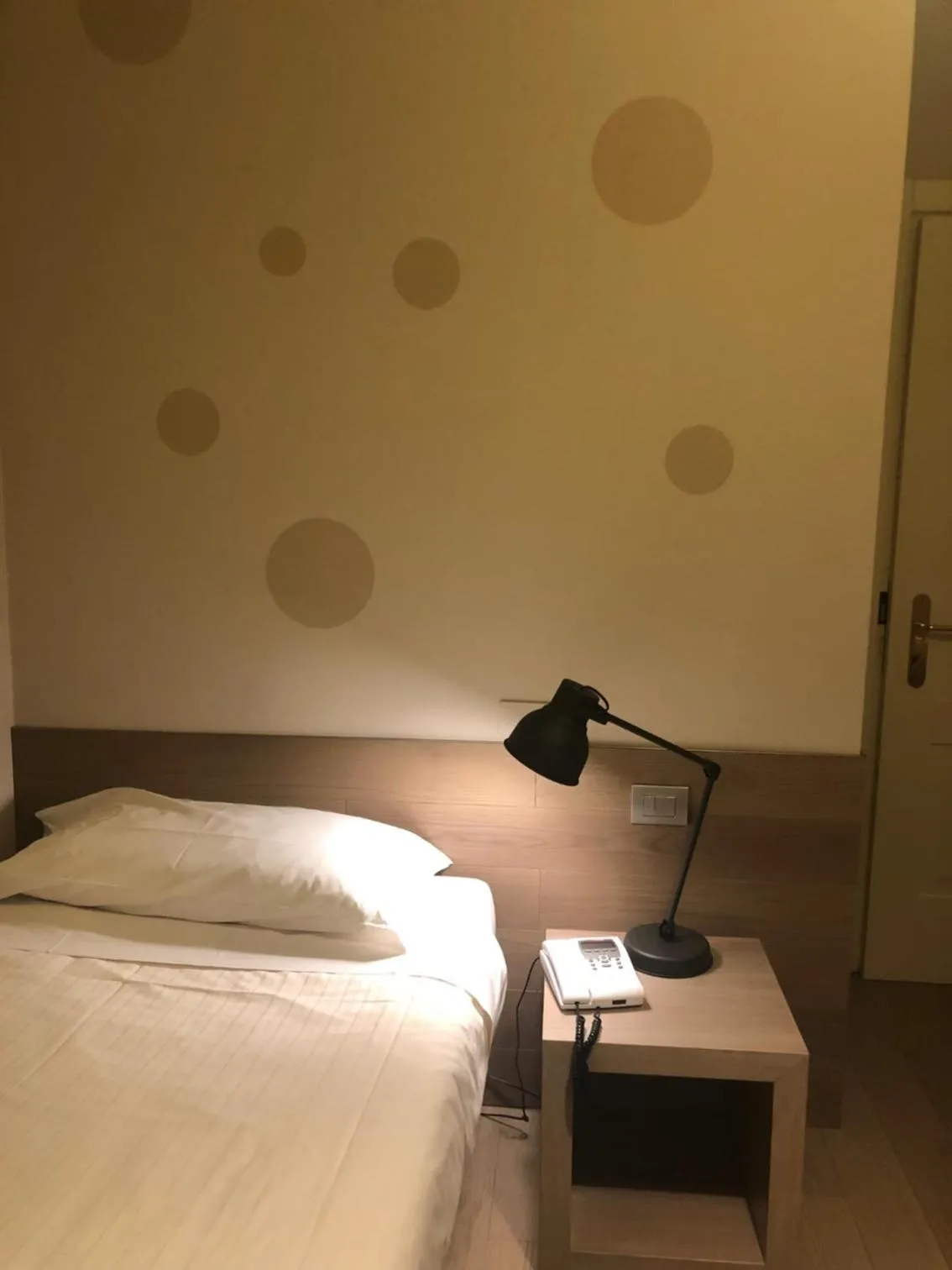 Bed in Albergo Tre Pozzi