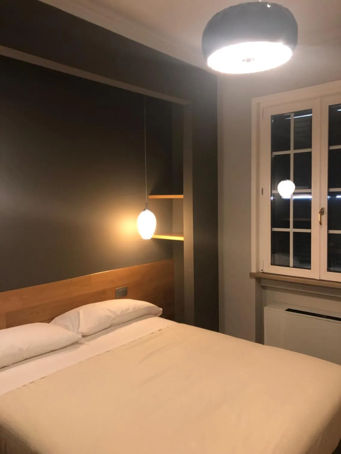 Bed in Albergo Tre Pozzi