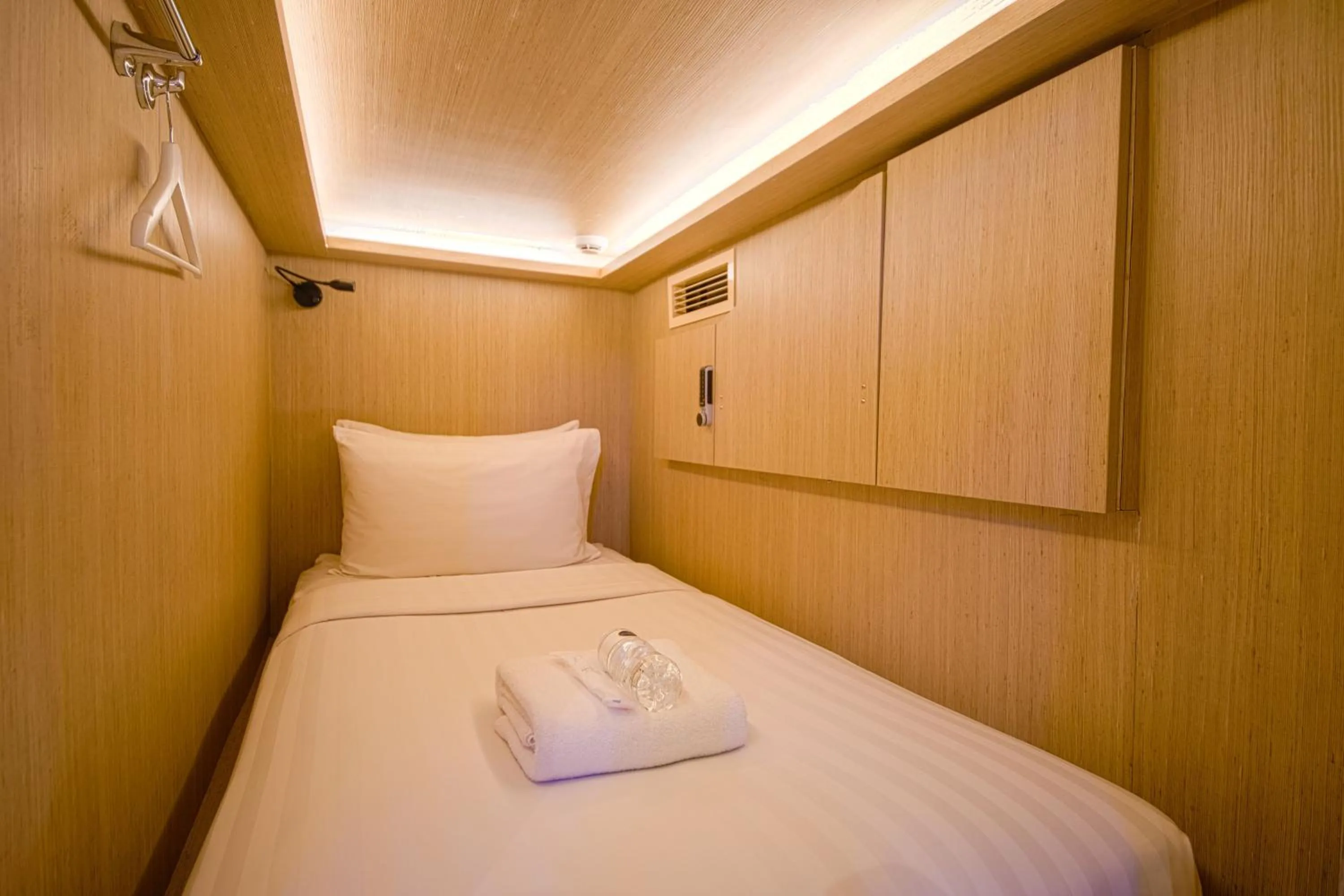 Bed in CUBE Boutique Capsule Hotel at Kampong Glam