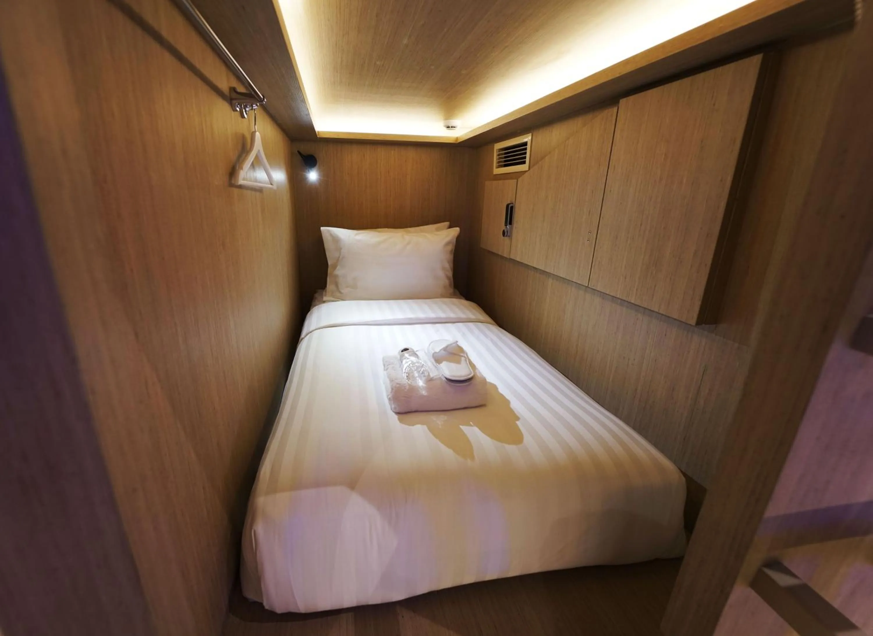 Bed in CUBE Boutique Capsule Hotel at Kampong Glam