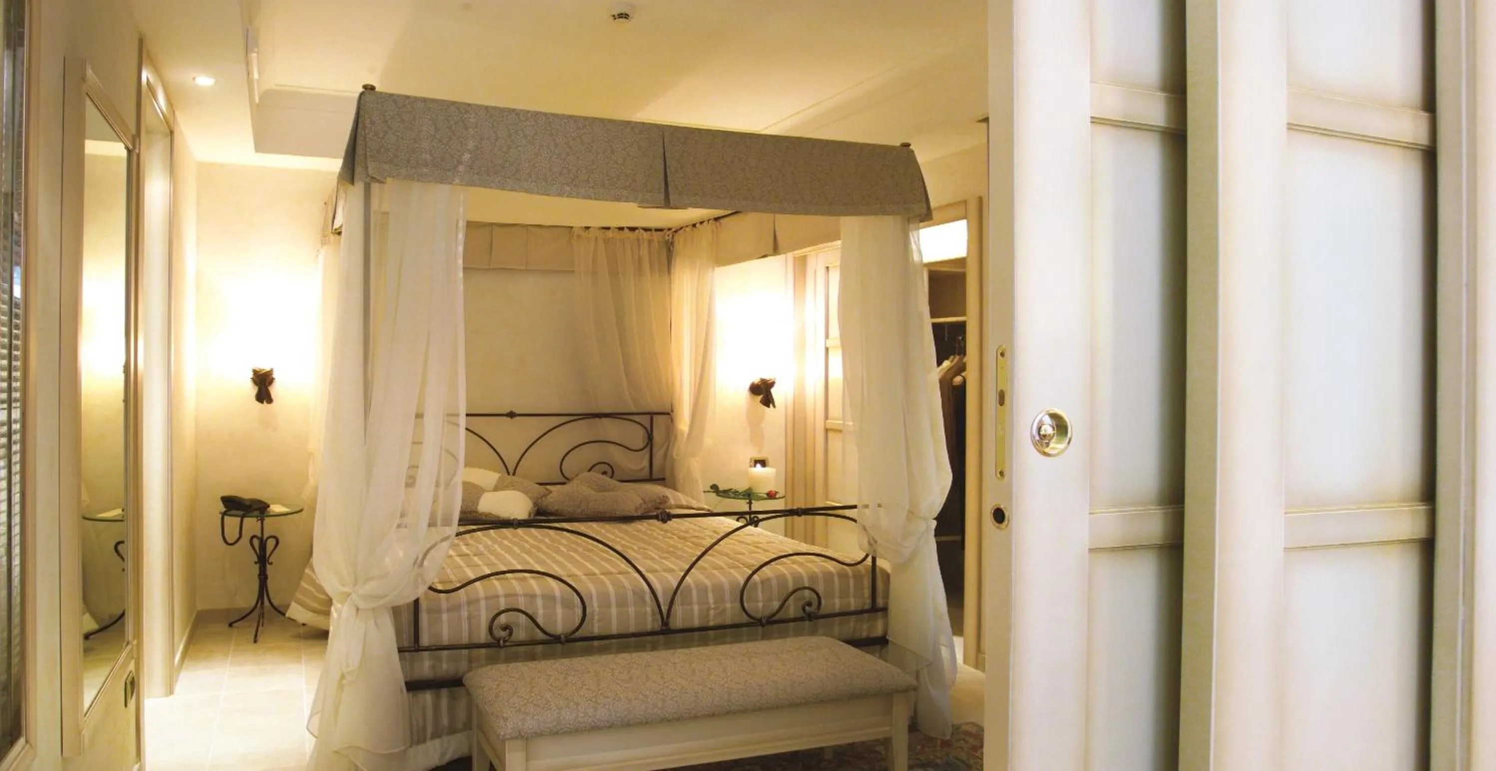 Bed in AH Premium Baia dei Faraglioni