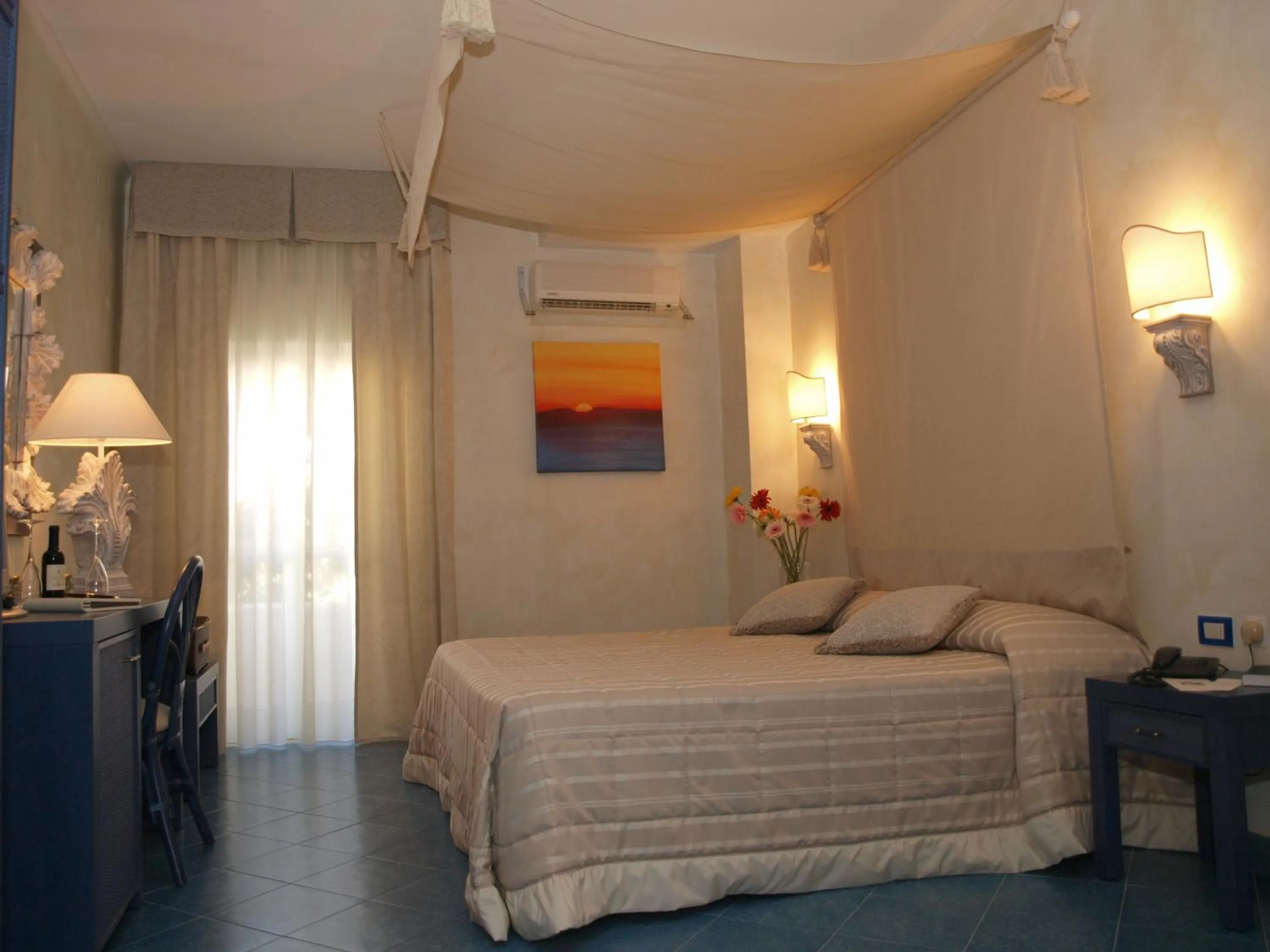 Bed in AH Premium Baia dei Faraglioni