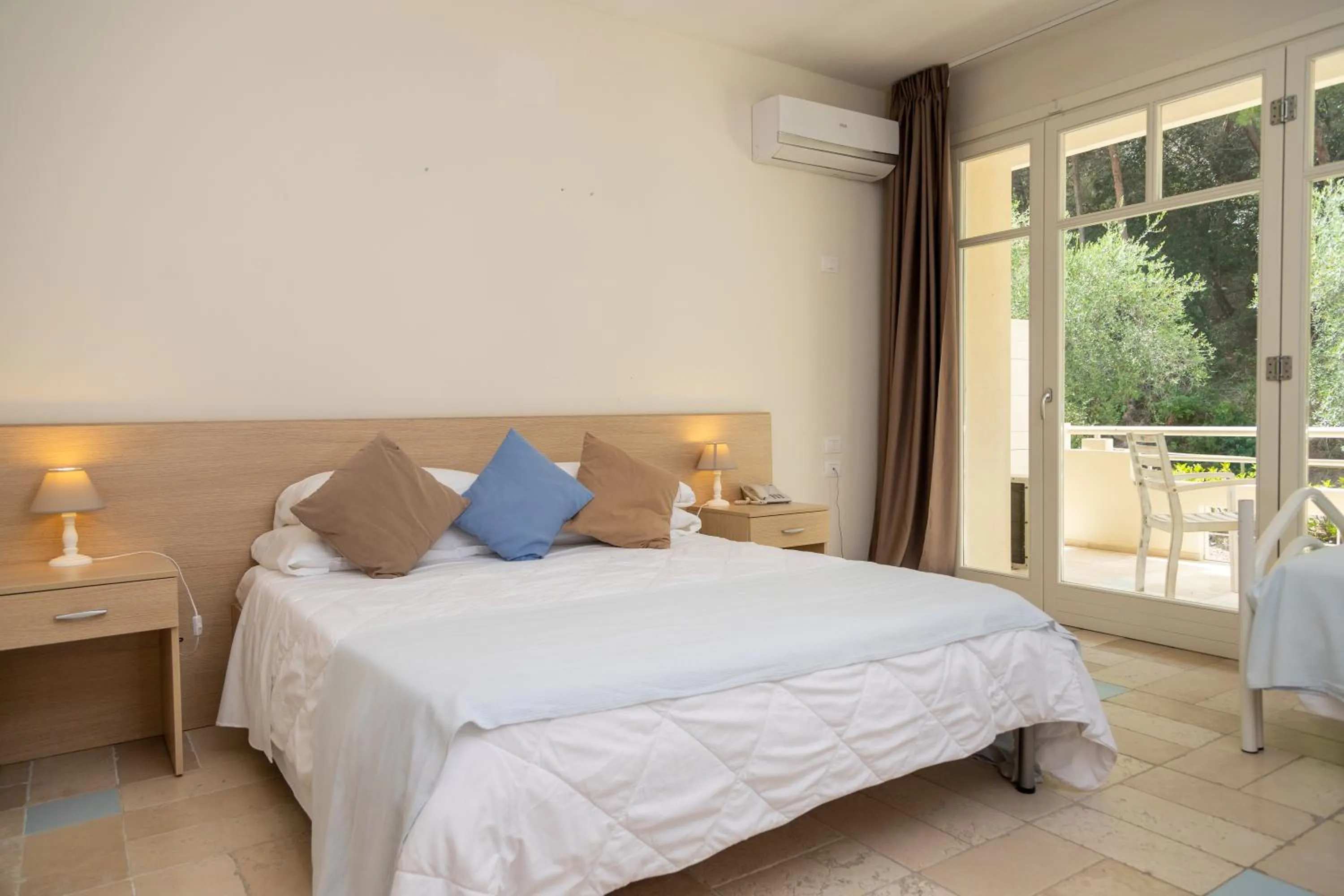 Bed in AH Premium Baia dei Faraglioni