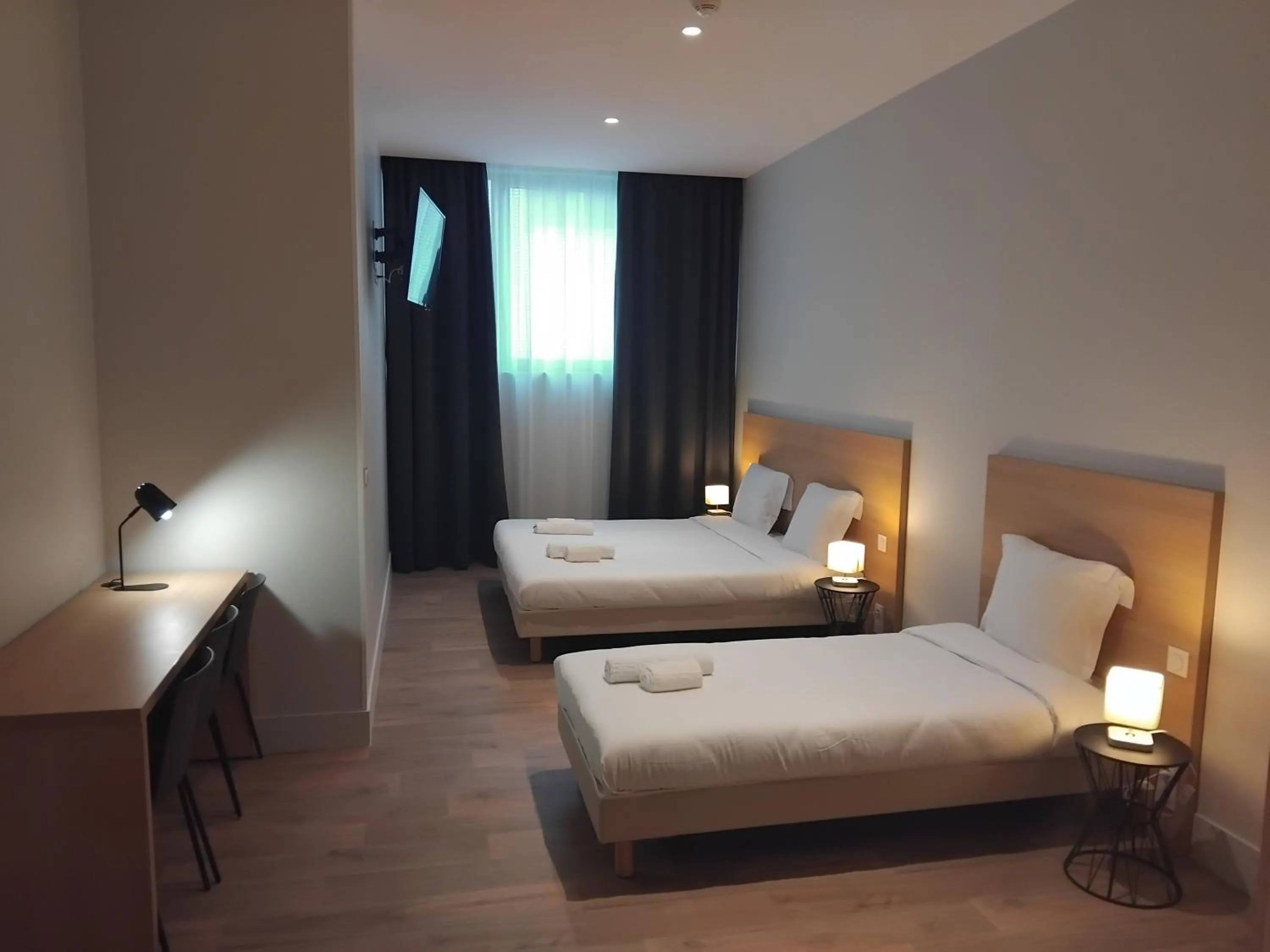 Bed in APPART'HOTEL RESIDIS Paray Orly