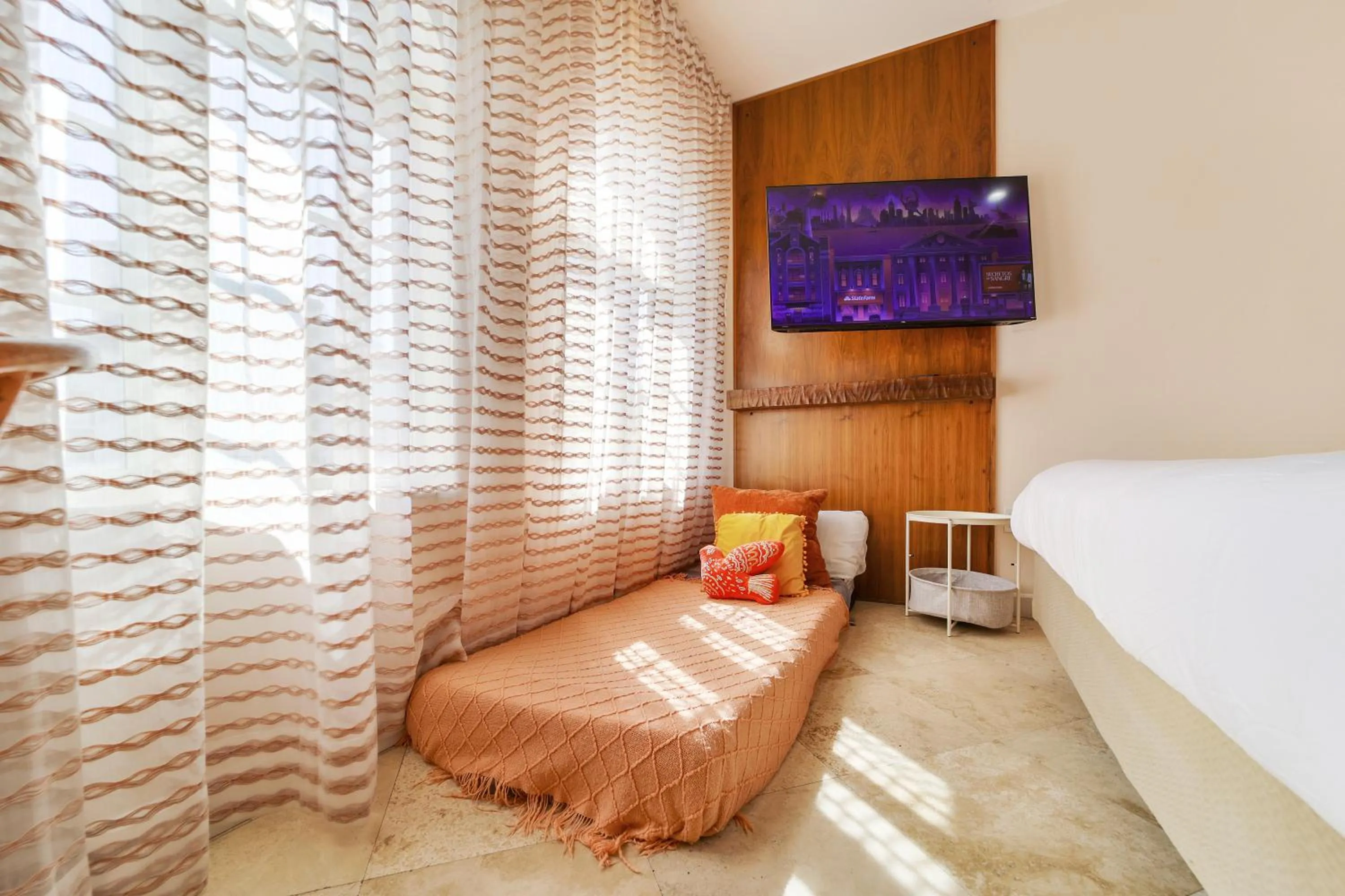 Bed in Casa Victoria Orchid Hotel