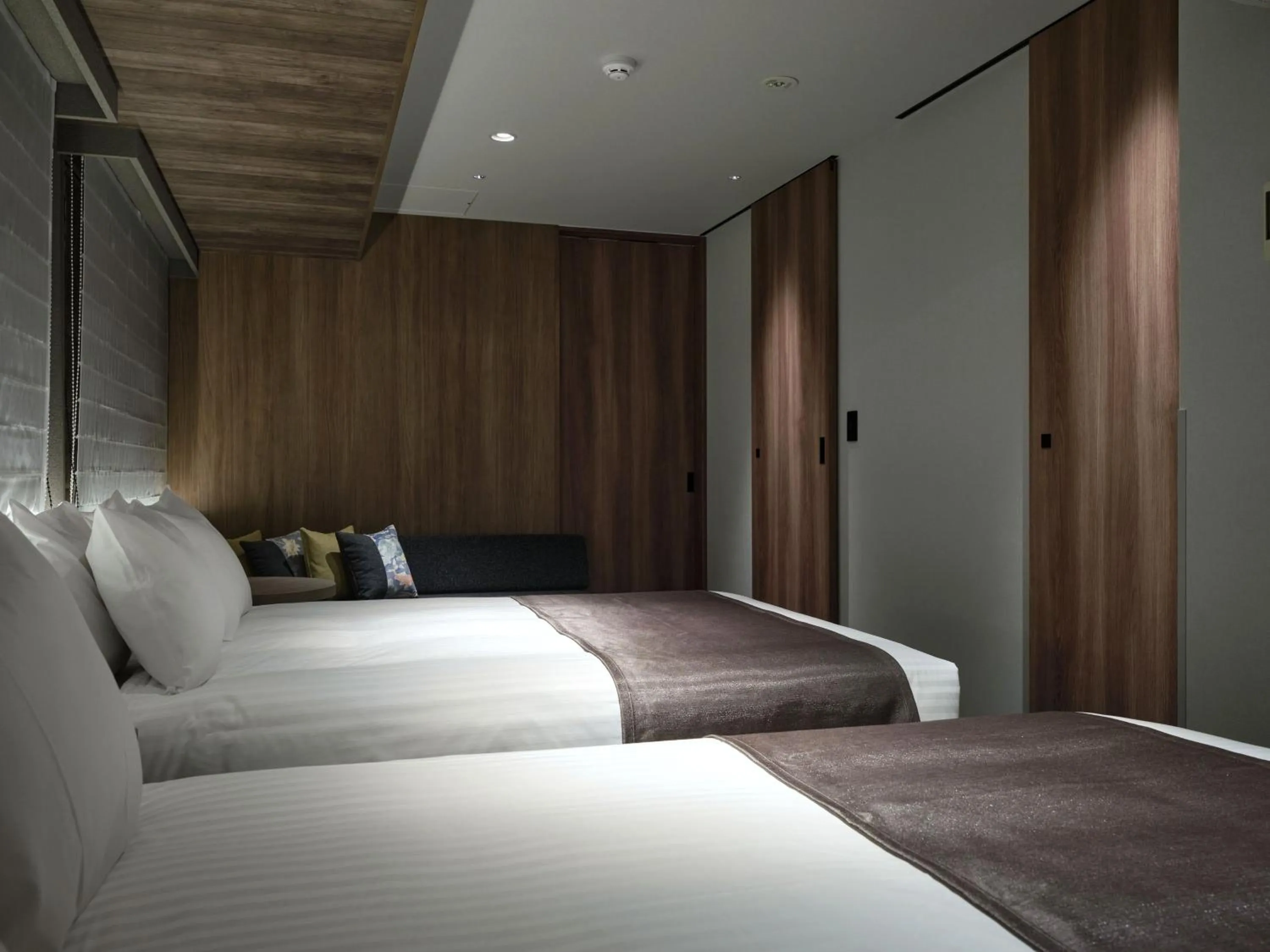 Bed in MONday Apart Premium Kyoto Sta Kamogawa