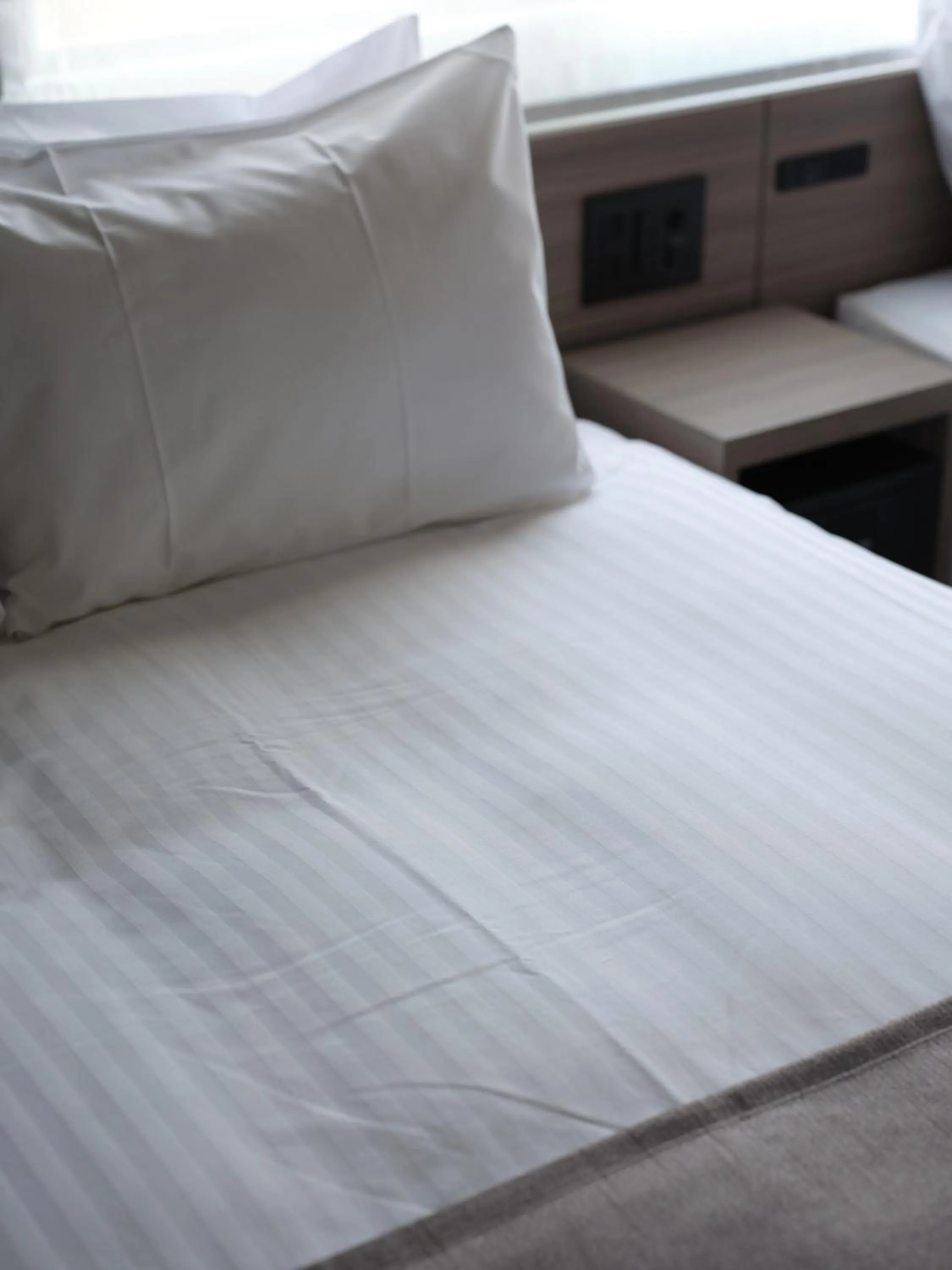 Bed in MONday Apart Premium Kyoto Sta Kamogawa