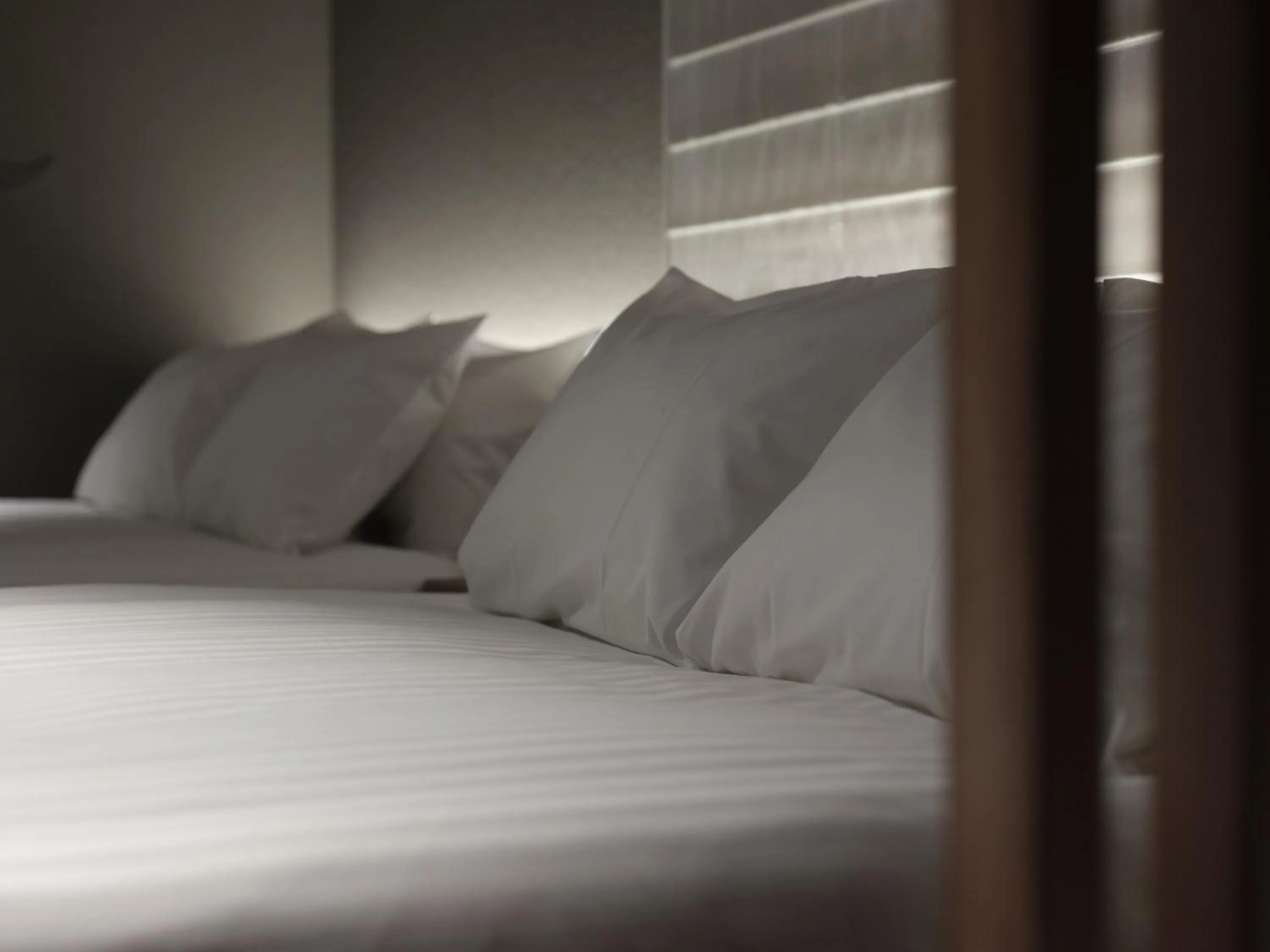 Bed in MONday Apart Premium Kyoto Sta Kamogawa