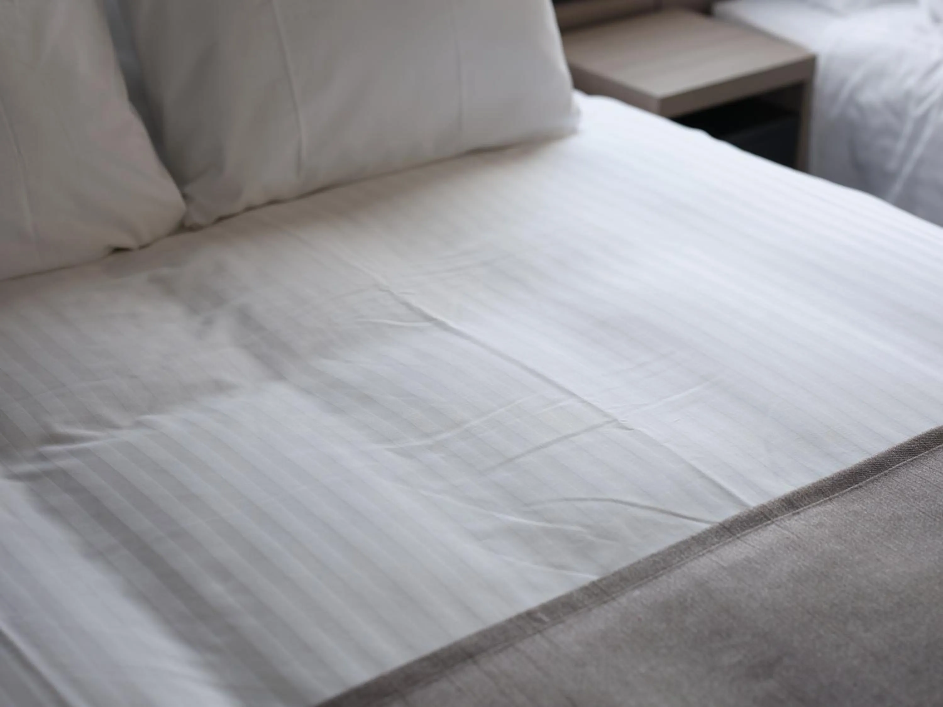 Bed in MONday Apart Premium Kyoto Sta Kamogawa