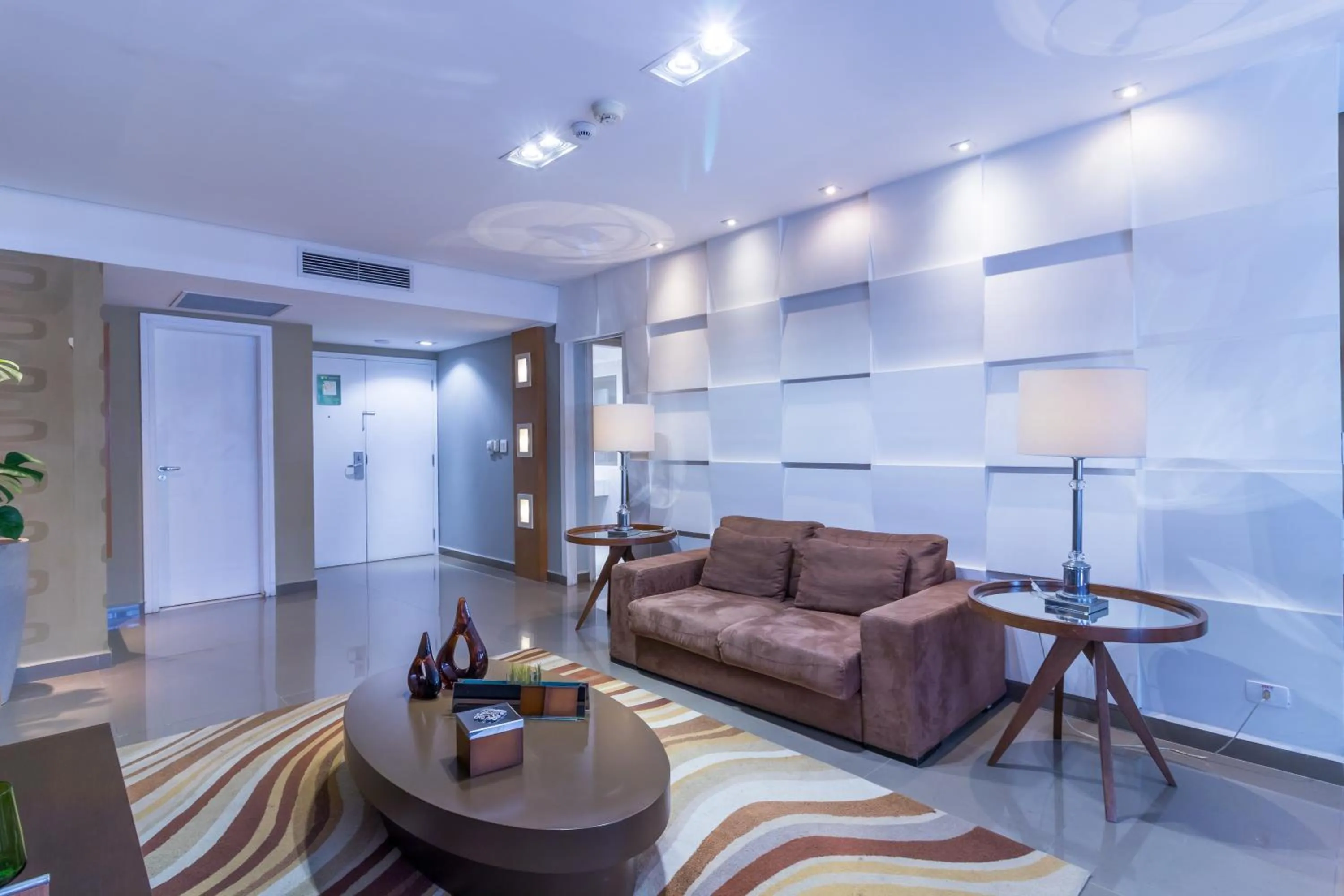 Living room in Parque Balneário Hotel Santos by Castelo Itaipava