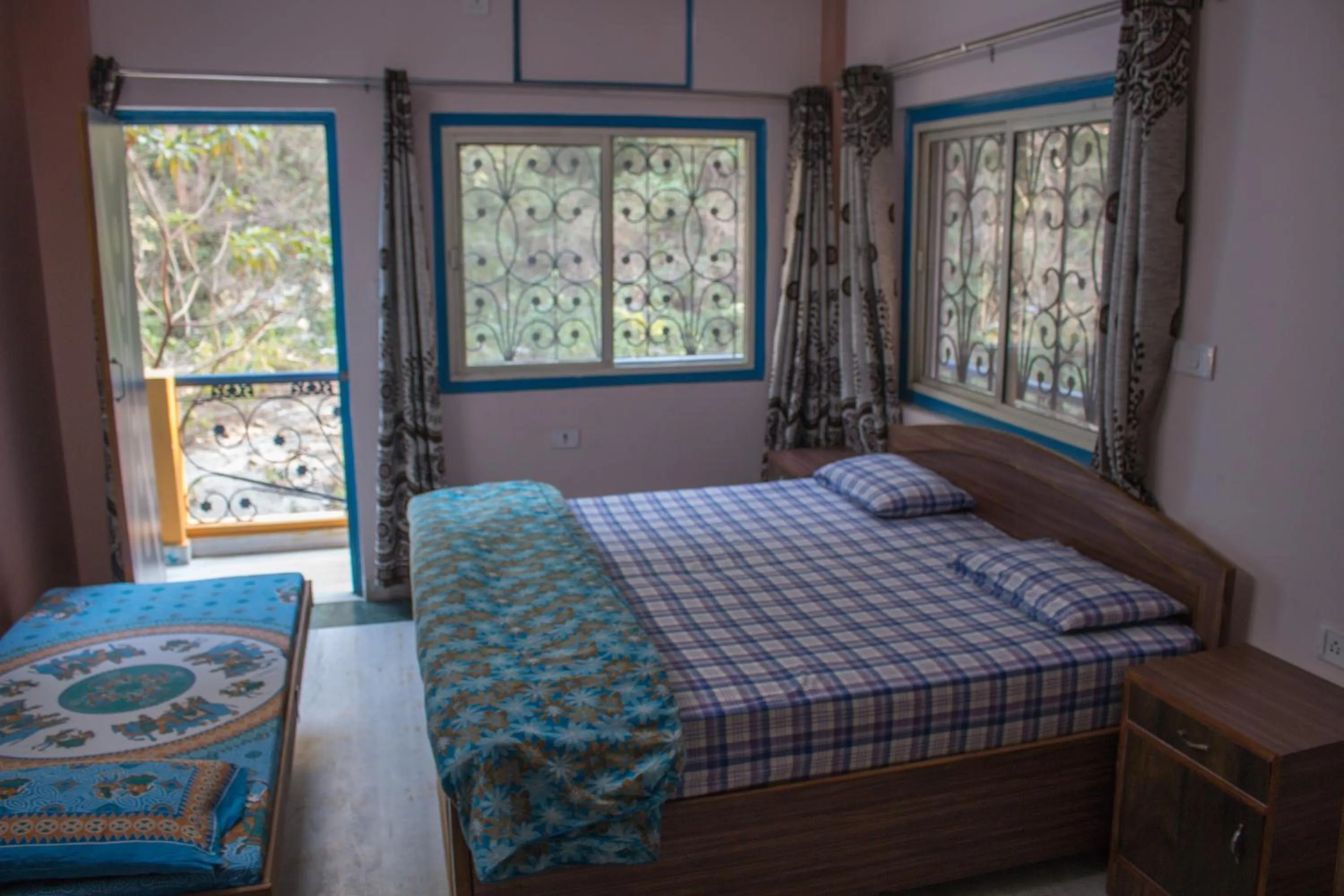 Photo of the whole room in Hotel Golden Crown Laxman Jhula