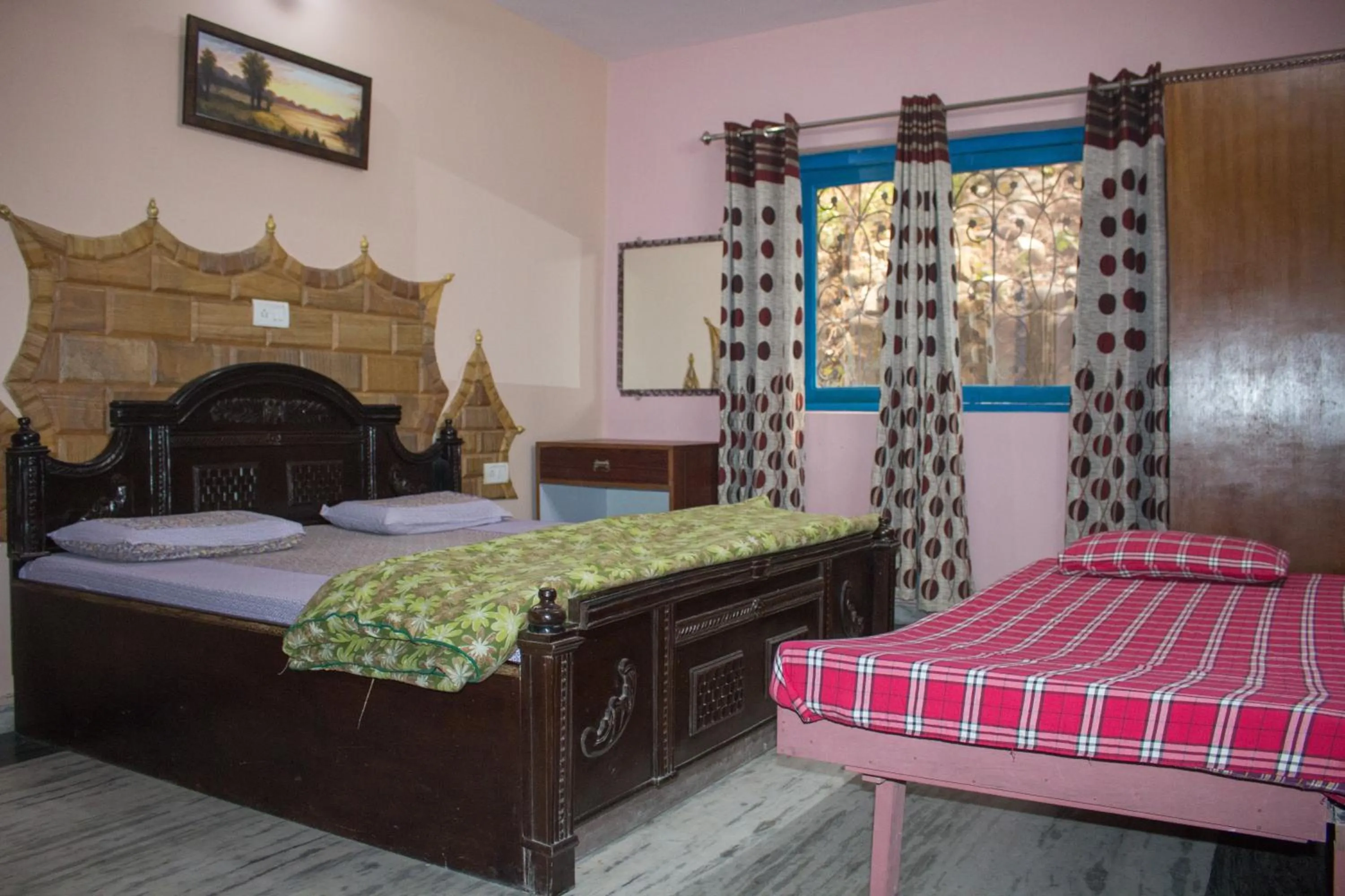 Photo of the whole room in Hotel Golden Crown Laxman Jhula