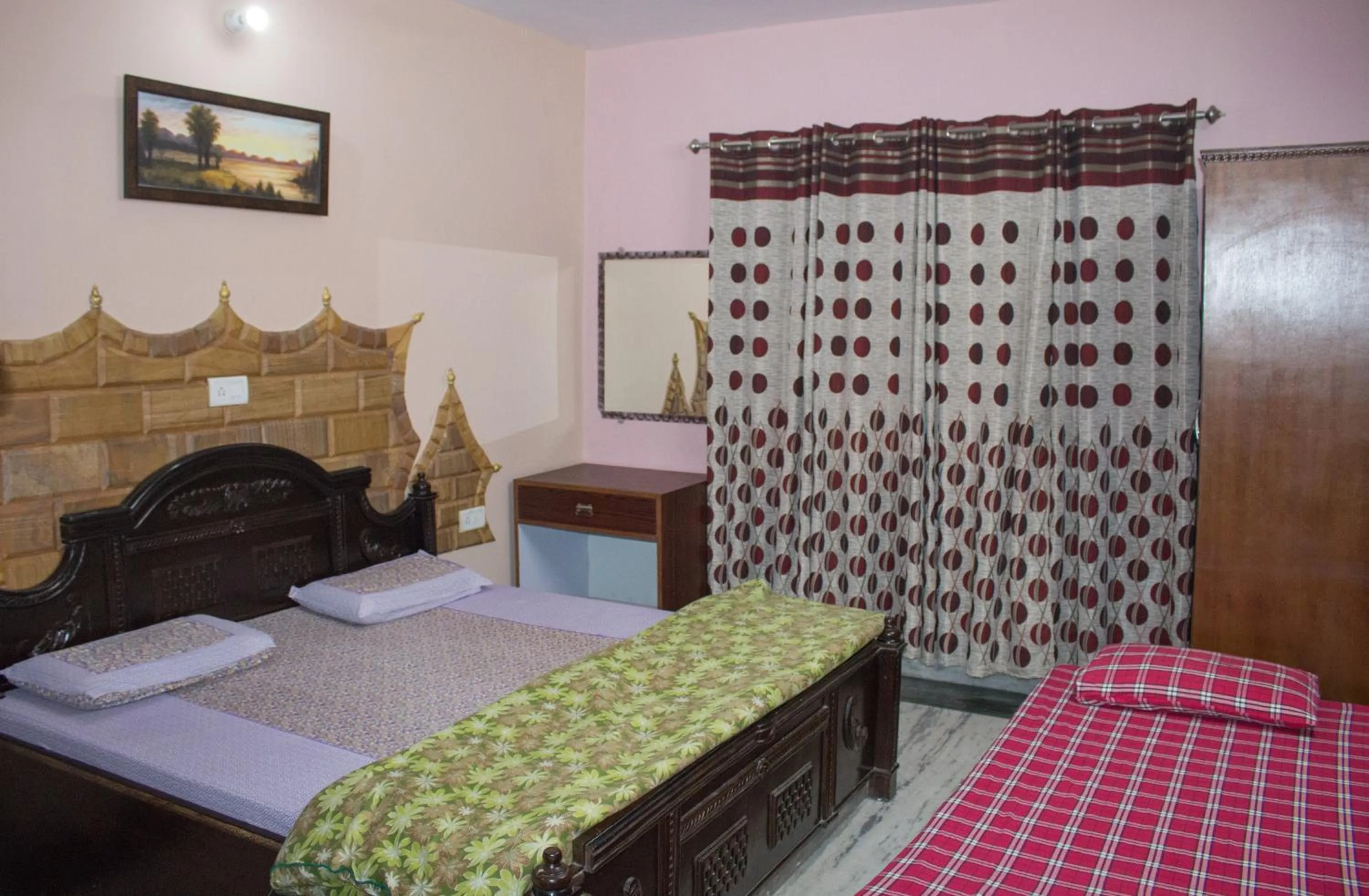 Photo of the whole room in Hotel Golden Crown Laxman Jhula