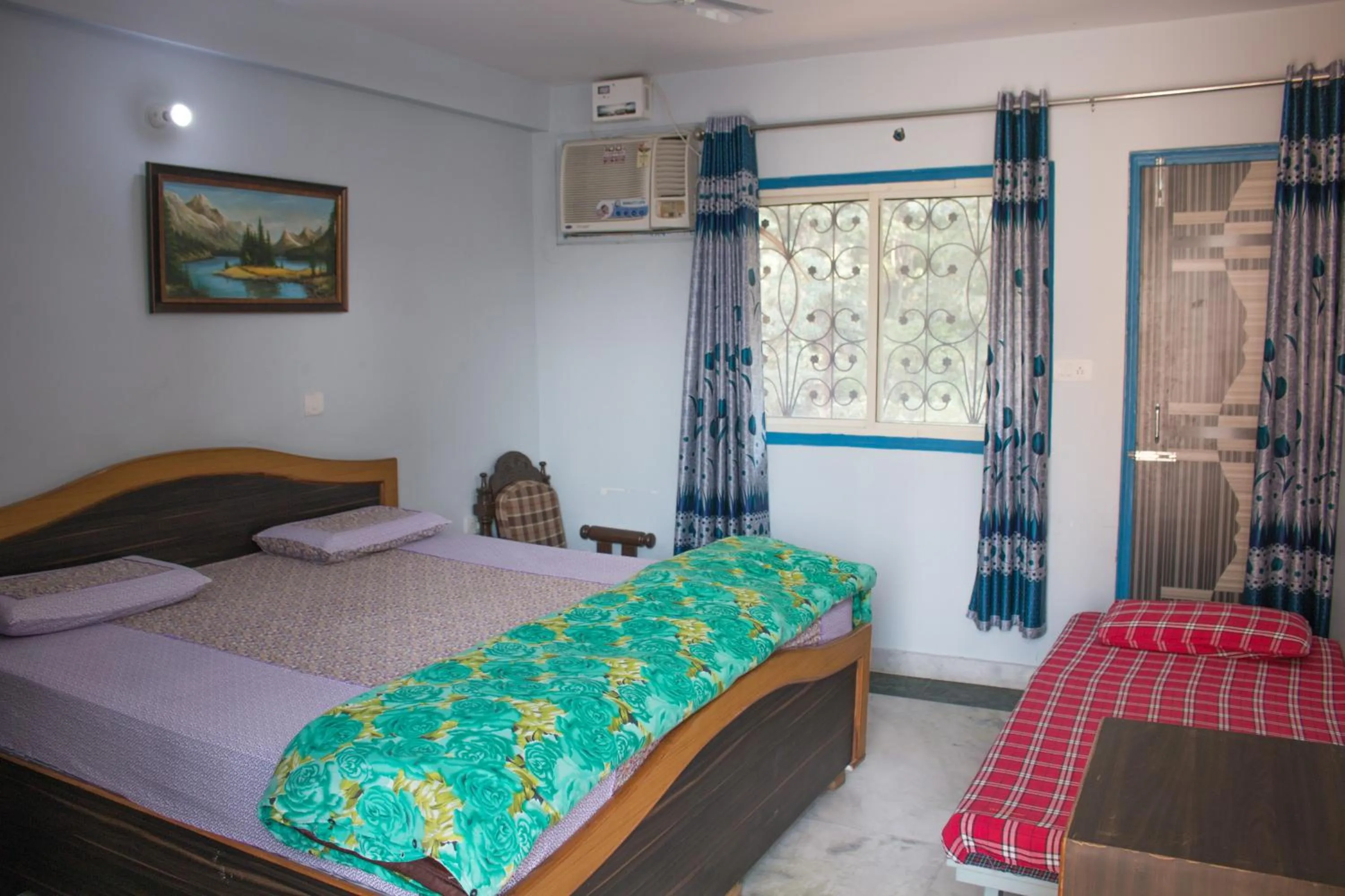 Photo of the whole room in Hotel Golden Crown Laxman Jhula