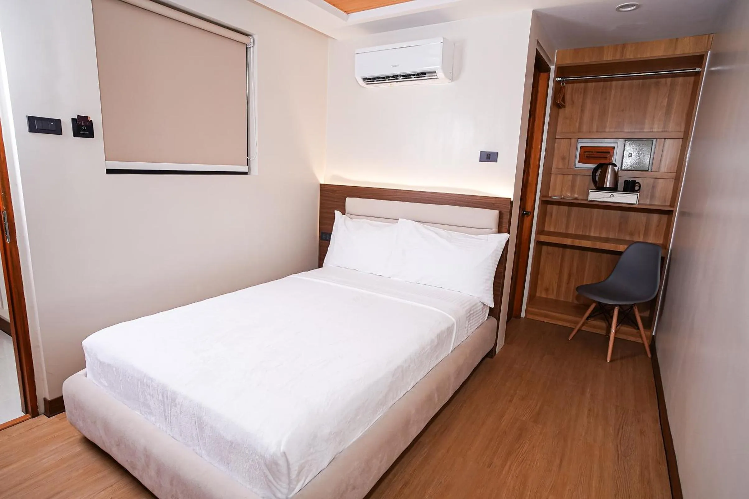 Bed in Gonzales Hotel