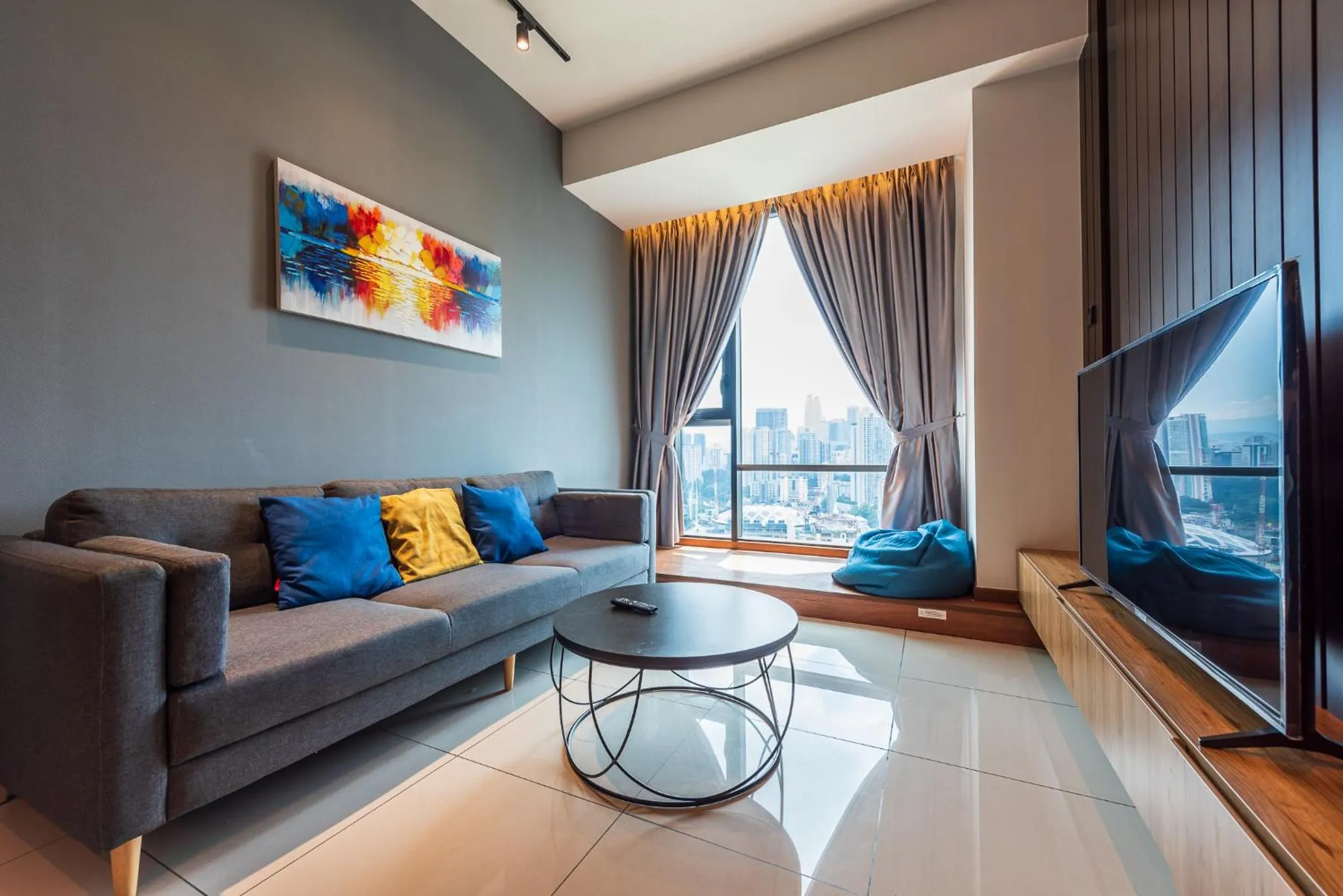 Living room in Opus Residences by Centurypro
