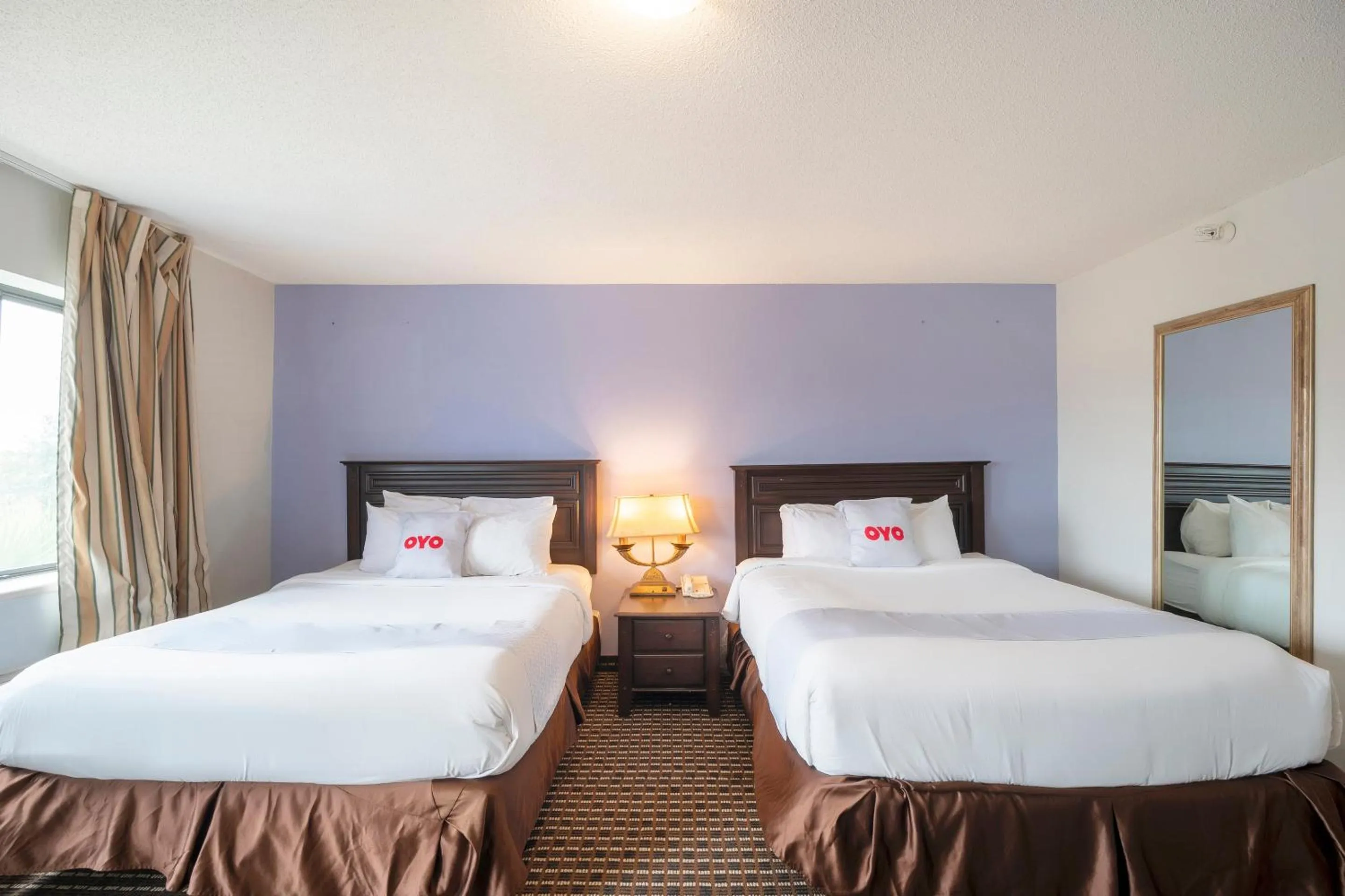 Bedroom, Bed in OYO Townhouse Houston Airport North